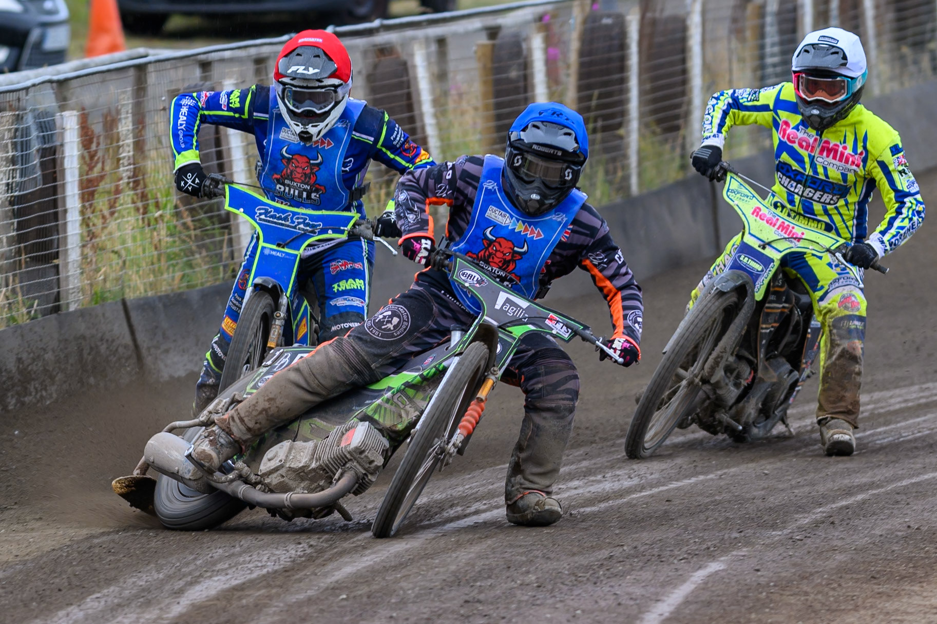 Jack Roberts of Buxton Bulls in Blue leading Arran Butcher of Buxton Bulls in Red  and Ashton Vale of Oxford Chargers in White  during the WSRA National Development League match between Buxton Bulls and Oxford Chargers at Hi-Edge Speedway, Buxton on Sunday 2nd August 2026. (Photo: Ian Charles | MI News)