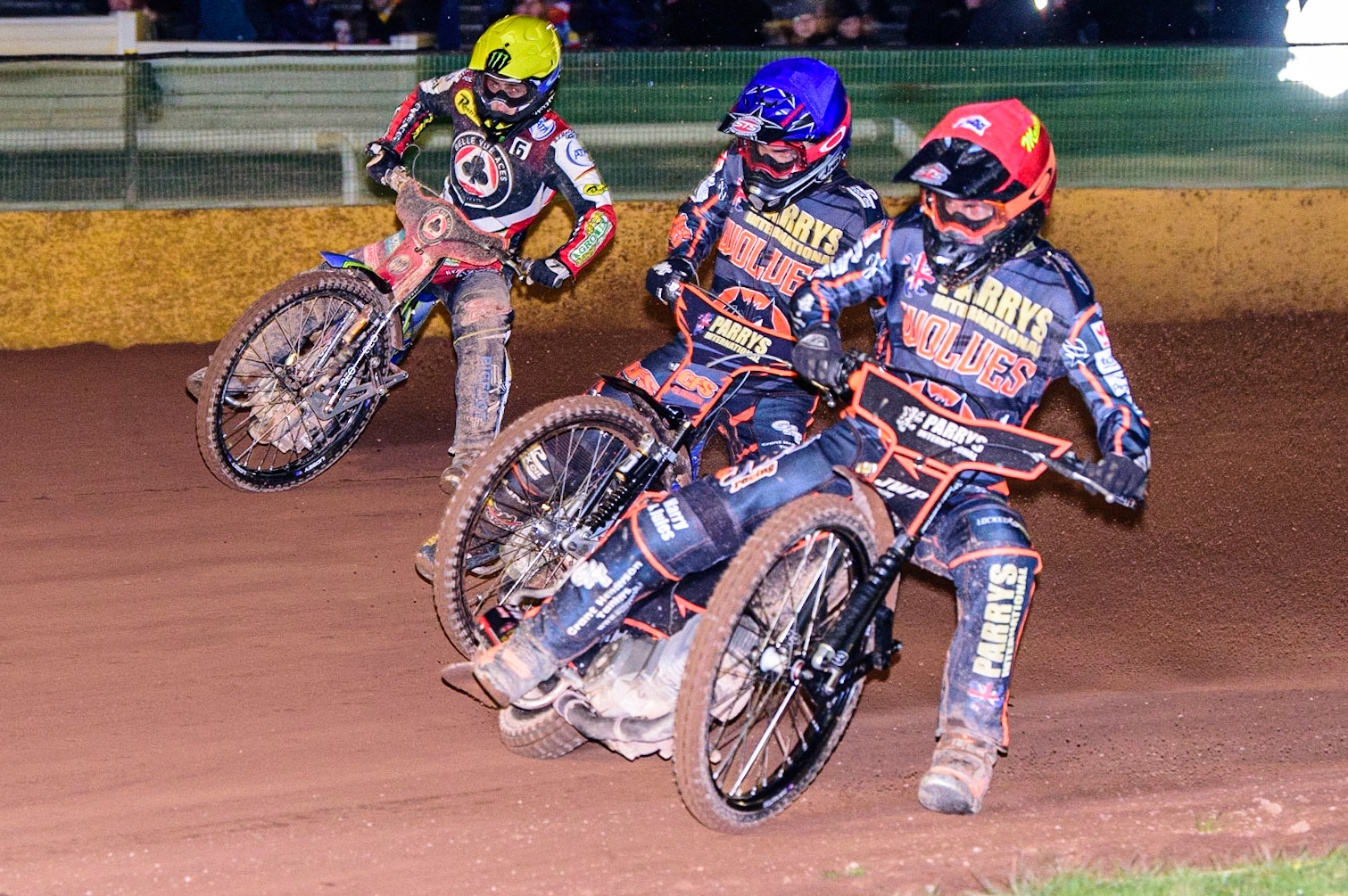 Sam Masters  (Red) and Steve Worrall  (Blue) inside Jaimon Lidsey  (Yellow) during the SGB Premiership Knock Out Cup Quarter Final 1st Leg between Wolverhampton Wolves and Belle Vue Aces at Monmore Green Stadium, Wolverhampton on Monday 10th April 2023. (Photo: Ian Charles | MI News)
