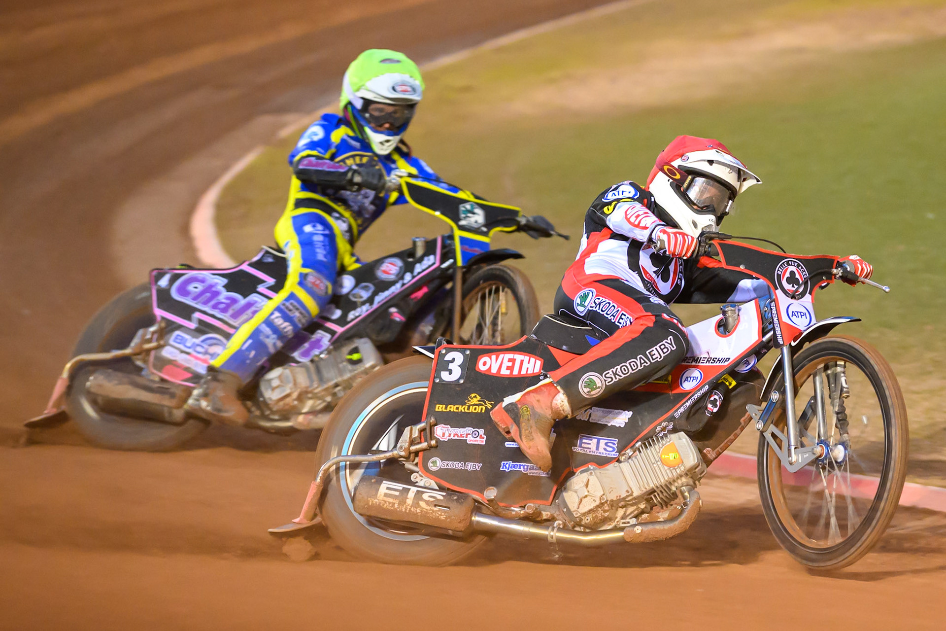 Peter Kildemand of Belle Vue Aces in Red leading Leon Flint of Sheffield Tigers in Yellow during the Rowe Motor Oil Premiership match between Belle Vue Aces and Sheffield Tigers at the National Speedway Stadium, Manchester on Monday 14th September 2026. (Photo: Ian Charles | MI News)