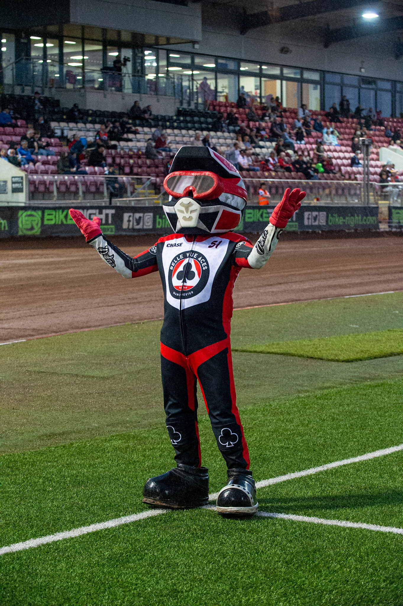 MANCHESTER, UK. JULY 2ND  Belle Vue Mascot Chase The Ace reacts to the rain that started at heat 15 during the National Development League match between Belle Vue Colts and Kent Royals at the National Speedway Stadium, Manchester on Friday 2nd July 2021. (Credit: Ian Charles | MI News)