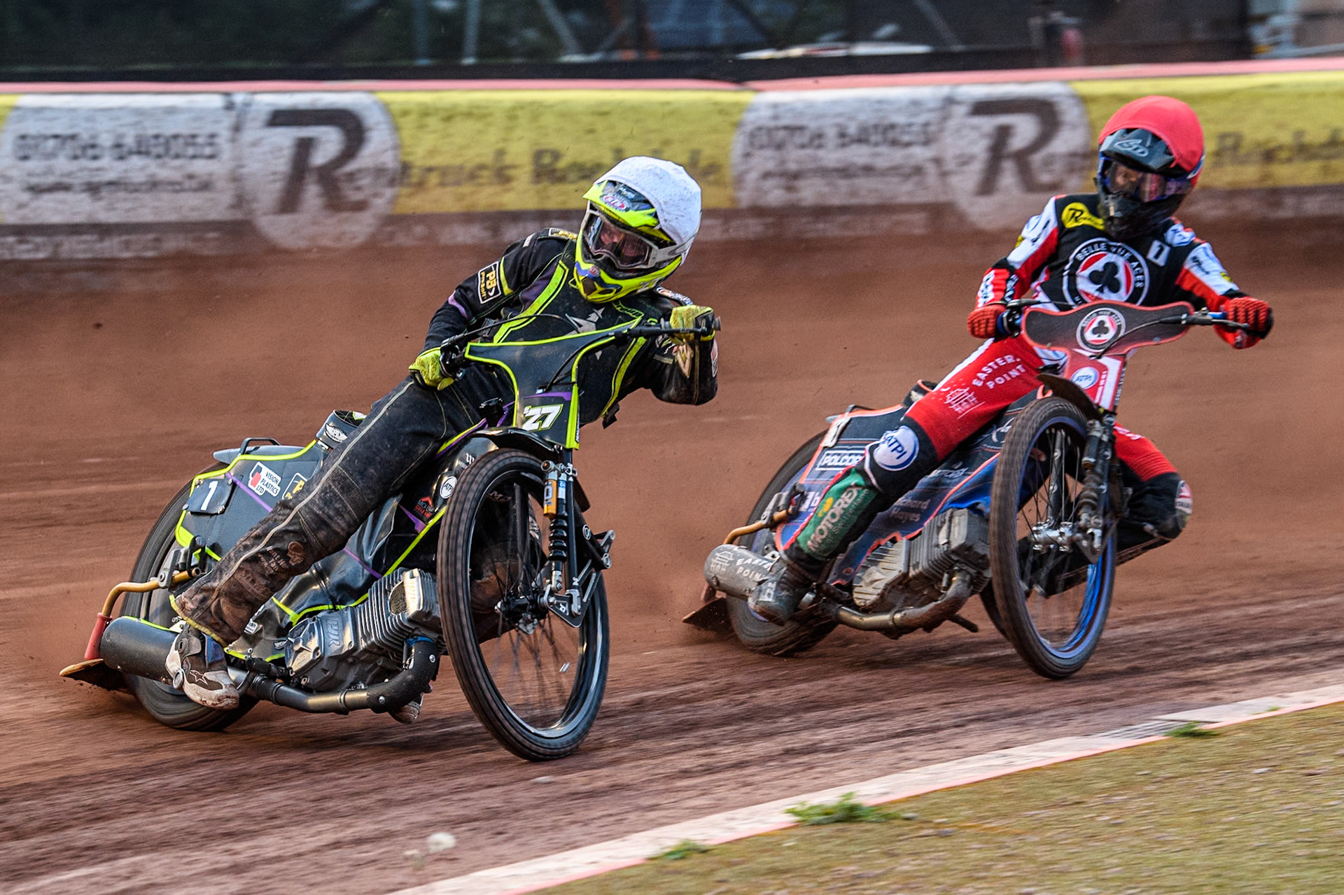 Ipswich Witches' Guest Rider Tom Brennan  in White leading Belle Vue Aces' Brady Kurtz  in Red during the Rowe Motor Oil Premiership match between Belle Vue Aces and Ipswich Witches at the National Speedway Stadium, Manchester on Monday 1st July 2024. (Photo: Ian Charles | MI News)