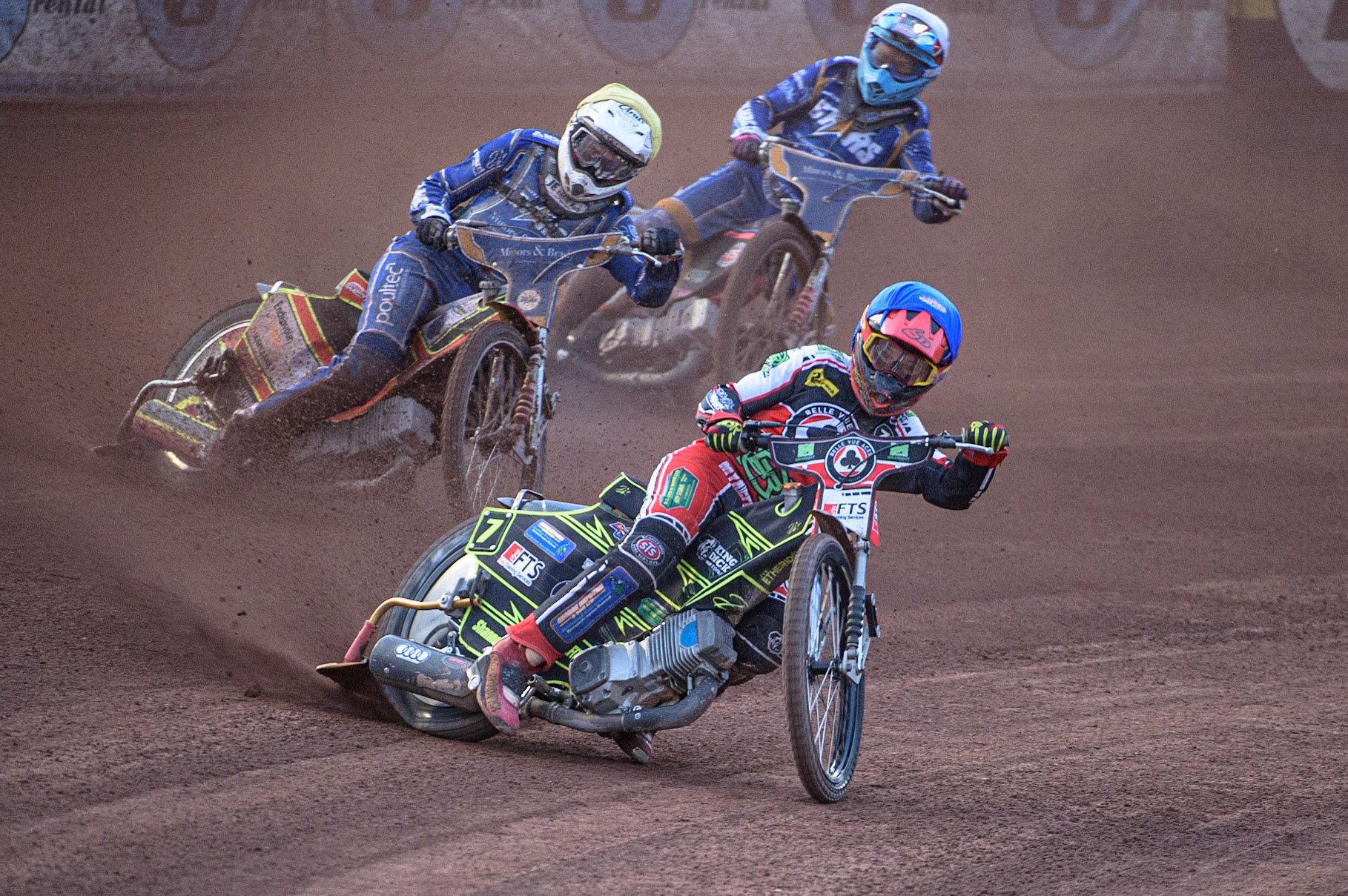 MANCHESTER, UK. AUGUST 23RD    Jye Etheridge  (Blue) leads Kasper Andersen  (Yellow) and Thomas Jorgensen (White) during the SGB Premiership match between Belle Vue Aces and King's Lynn Stars at the National Speedway Stadium, Manchester on Monday 23rd August 2021. (Credit: Ian Charles | MI News)