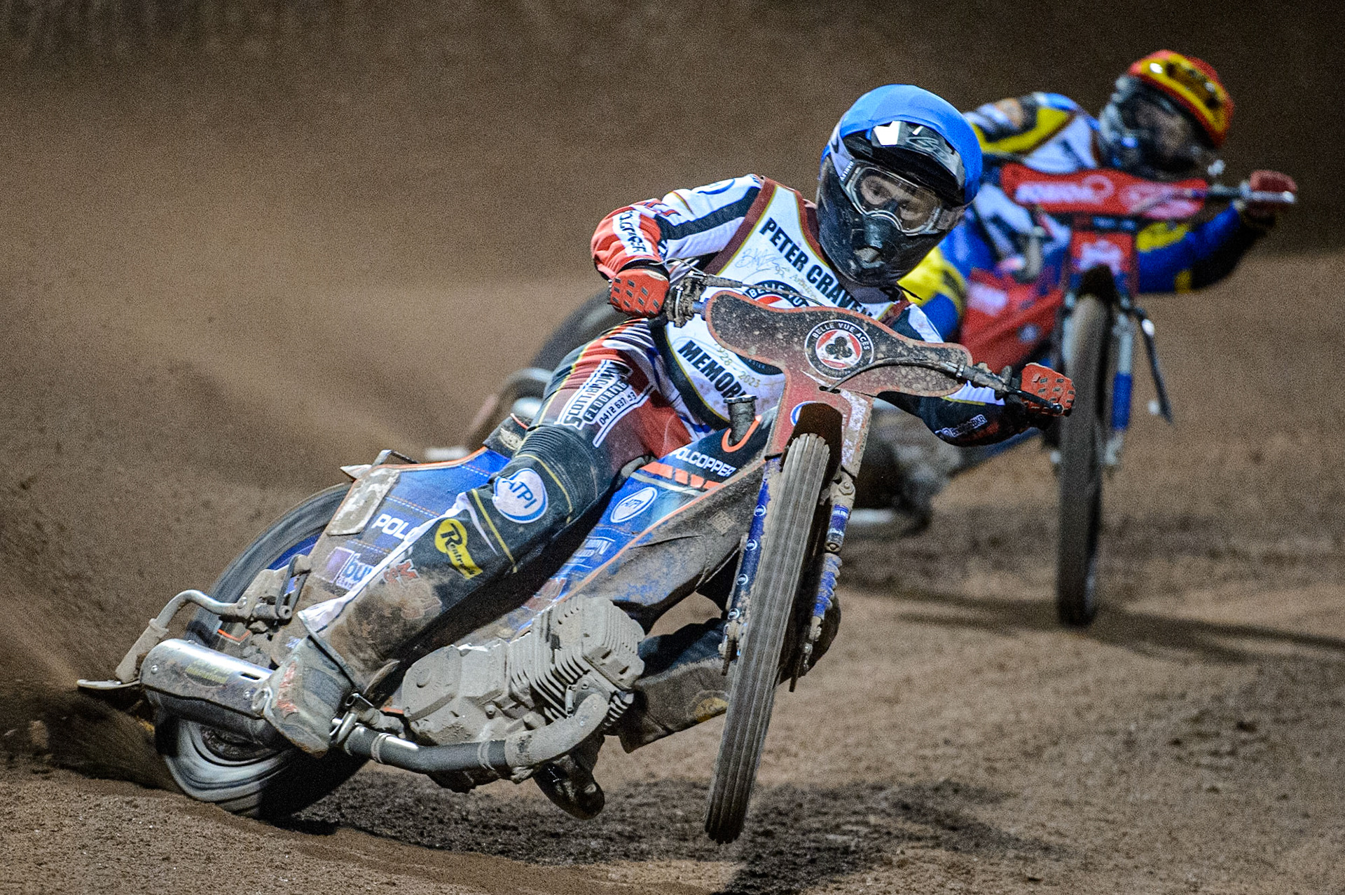 Brady Kurtz  (Blue) picks up some drive as he leads Tobiasz Musielak  (Red) during the Peter Craven Memorial Trophy  at the National Speedway Stadium, Manchester on Monday 3rd April 2023. (Photo: Ian Charles | MI News)