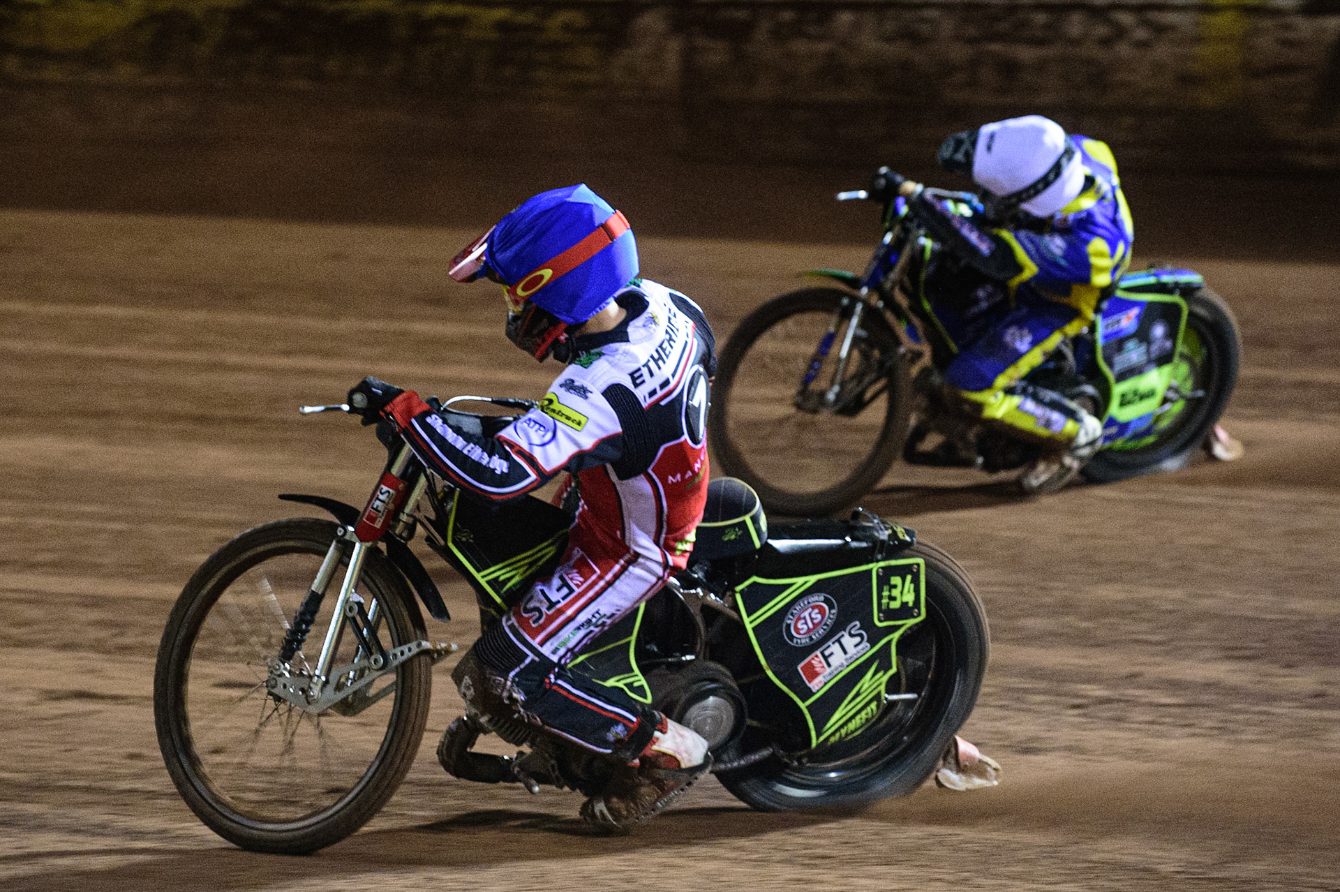MANCHESTER, UK. OCT 7TH  Jye Etheridge   (Blue) inside Troy Batchelor  (White) during the SGB Premiership Play off Semi-Final Second Leg between Belle Vue Aces and Sheffield Tigers at the National Speedway Stadium, Manchester on Thursday 7th October 2021. (Credit: Ian Charles | MI News)
