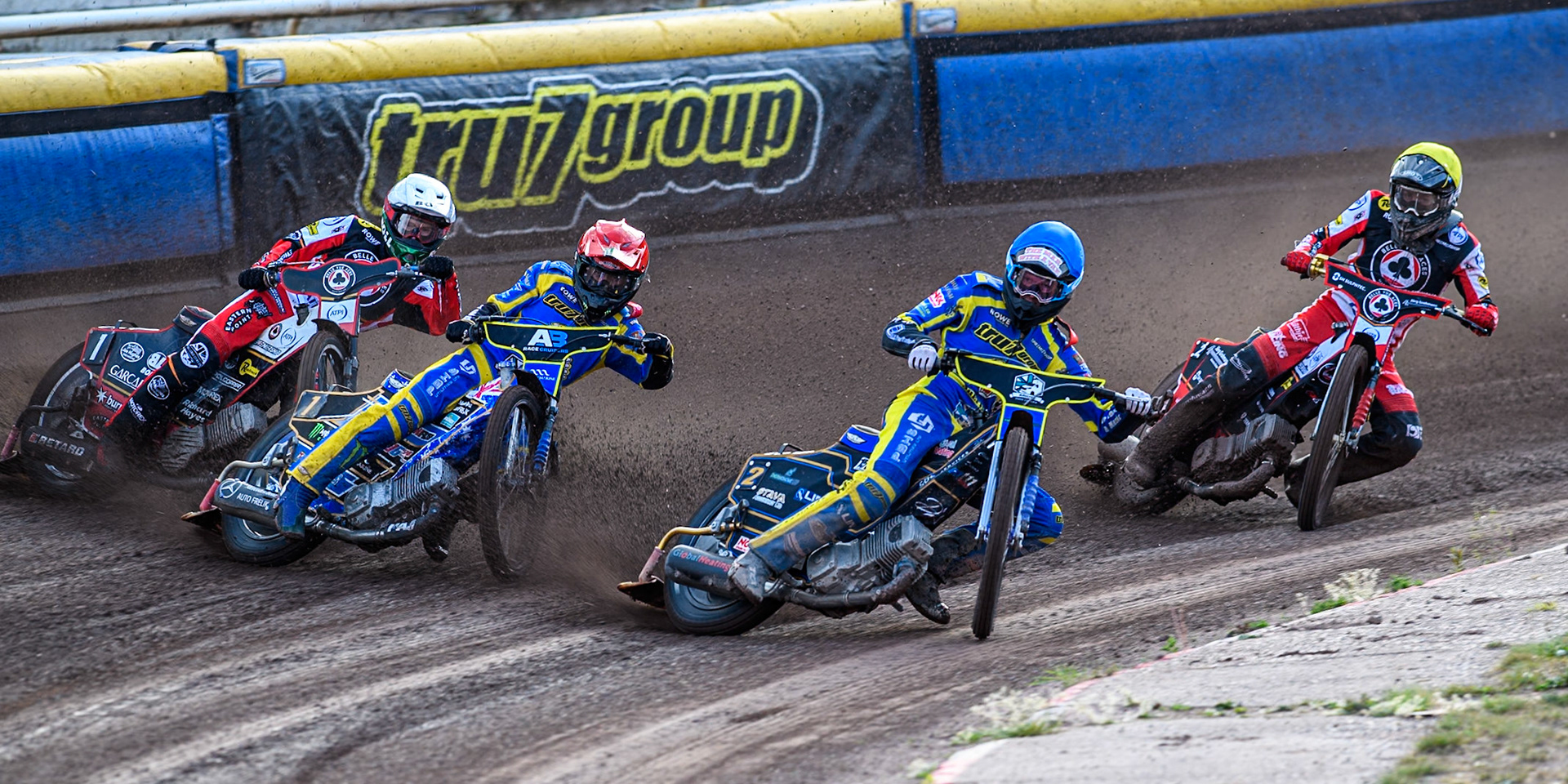 Anders Rowe of Sheffield Tigers in Blue leading Jack Holder of Sheffield Tigers in Red Brady Kurtz of Belle Vue Aces in White and Norick Blödorn of Belle Vue Aces in Blue during the Rowe Motor Oil Premiership match between Sheffield Tigers and Belle Vue Aces at Owlerton Stadium, Sheffield on Monday 5th May 2025. (Photo: Ian Charles | MI News)