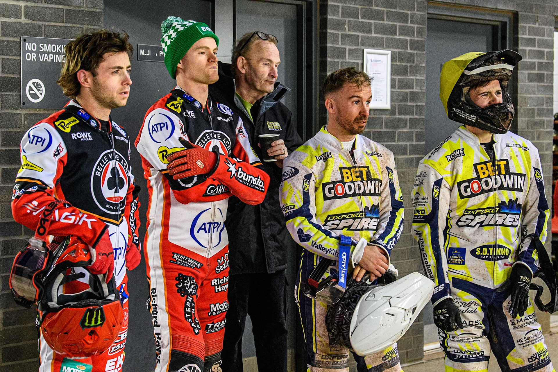 (L to R) Belle Vue Aces' Jaimon Lidsey, Belle Vue Aces' Brady Kurtz, Oxford Spires' Rohan Tungate and Oxford Spires' Maciej Janowski watch the replay on the TV Screen in the pits during the Rowe Motor Oil Premiership match between Belle Vue Aces and Oxford Spires at the National Speedway Stadium, Manchester on Monday 14th April 2025. (Photo: Ian Charles | MI News)