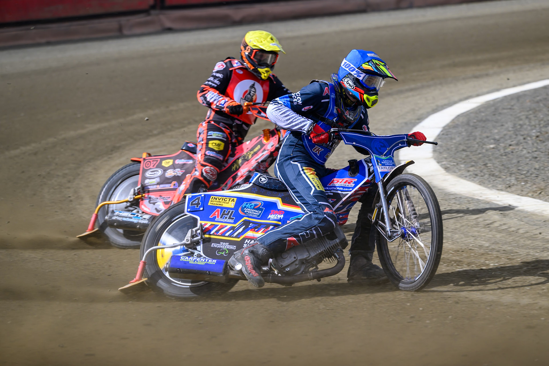 Jamie Etherington of Buxton Bulls  in Blue leading Alex Spooner of NDL Nomads   in Yellow during the  Challenge match between Buxton Bulls and NDL Nomads at Hi-Edge Speedway, Buxton on Sunday 19th April 2026. (Photo: Ian Charles | MI News)