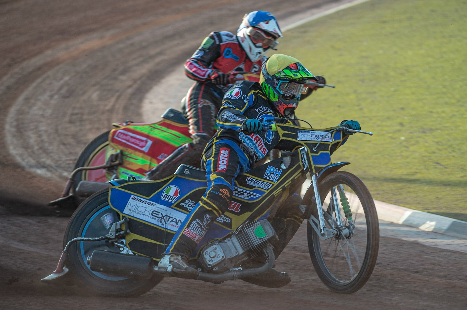 Photo: Ian Charles

Adam Extance  (Yellow) leads Ben Woodhull  (Blue)

Belle Vue Colts v Plymouth Gladiators National League, Belle Vue National Speedway Stadium, Manchester, Thursday 23  May  2019