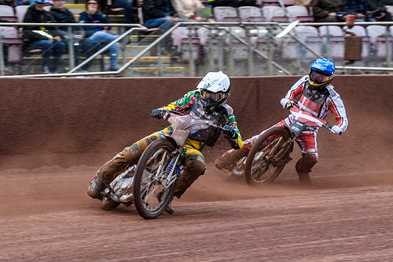 Jack Holder of Australia in White leading Anders Thomsen of Denmark in Blue during the Monster Energy FIM Speedway of Nation Semi Final 2 at the National Speedway Stadium, Manchester on Wednesday 10th July 2024. (Photo: Ian Charles | MI News)