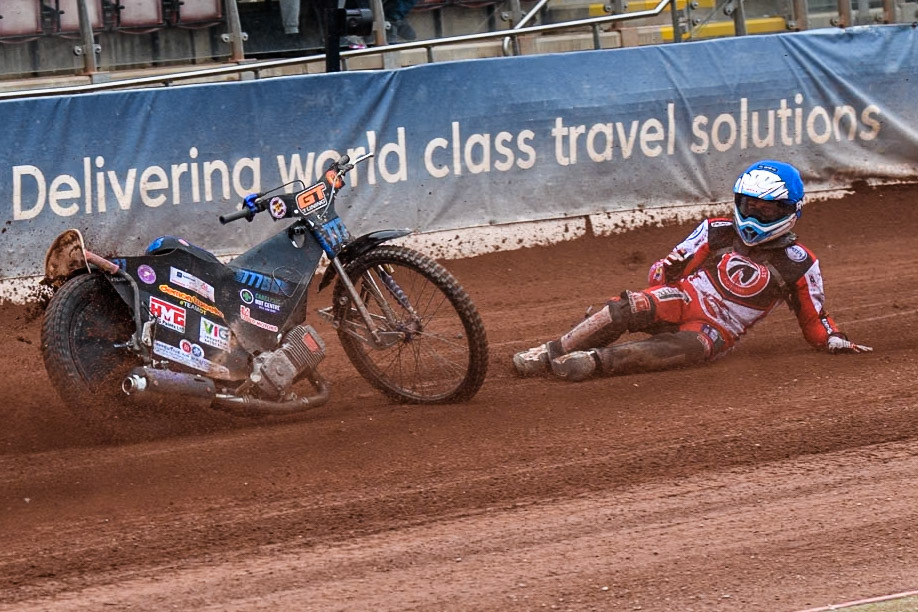 Belle Vue Colts' Billy Budd rears at the start between Leicester Lion Cubs' Guest Rider Darryl Ritchings in White and Leicester Lion Cubs' Sonny Springer in Yellow during the WSRA National Development League match between Belle Vue Colts and Leicester Lion Cubs at the National Speedway Stadium, Manchester on Friday 18th April 2025. (Photo: Ian Charles | MI News)