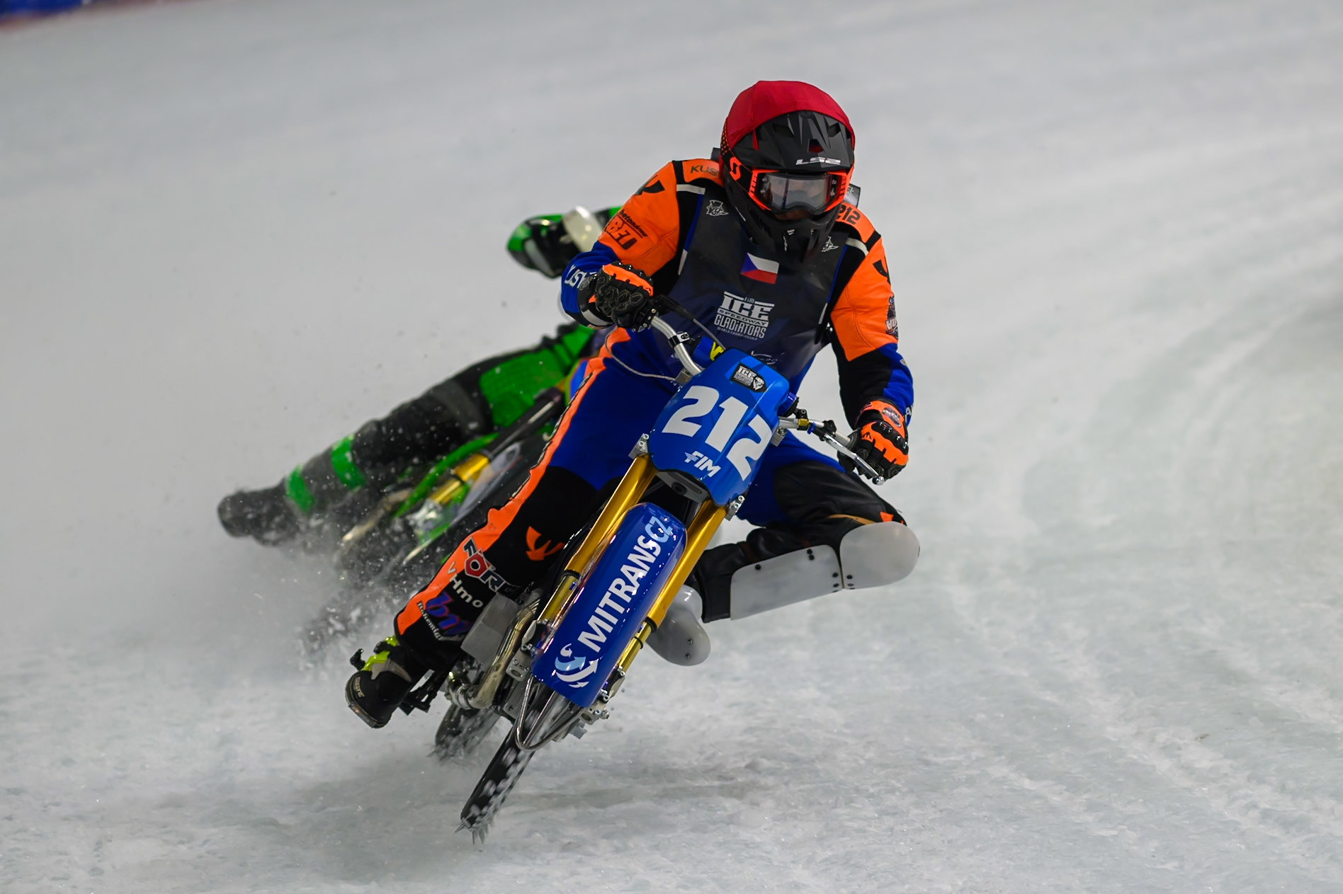Lukas Hutla (212) of Czechia hits a rut in the ice in front of Andrej Divis (107) of Czechia in Blue during the FIM Ice Speedway Gladiators World Championship Final 3 at Ice Rink Thialf, Heerenveen on Saturday 11th April 2026. (Photo: Ian Charles | MI News)
