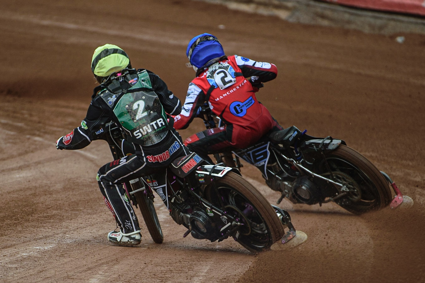 MANCHESTER, UK. APR 15TH  Sam McGurk  (Blue) passes Connor King  during the National Development League match between Belle Vue Colts and Plymouth Centurions at the National Speedway Stadium, Manchester on Friday 15th April 2022. (Credit: Ian Charles | MI News)