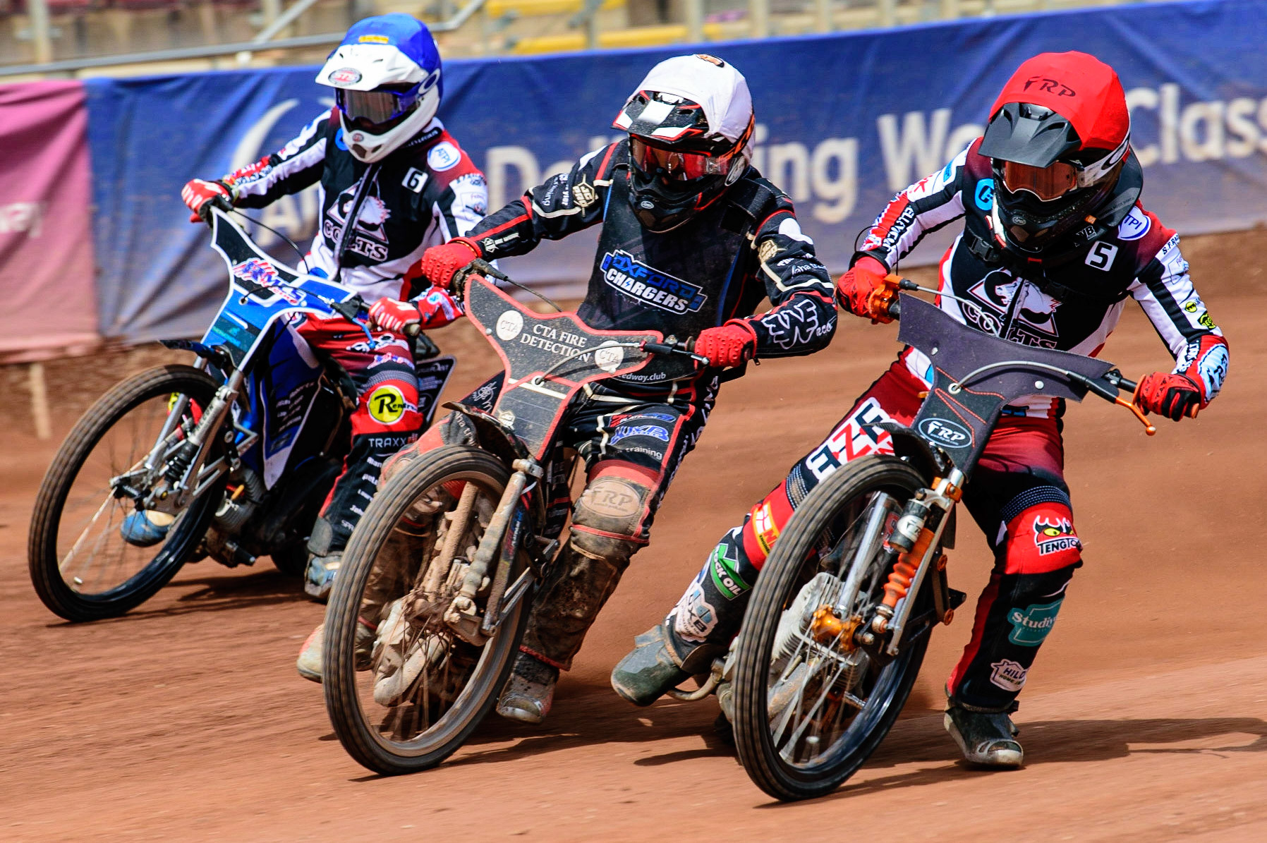 MANCHESTER, UK.  JUN 3RD  Jack Smith  (Red) inside Ben Morley (White) and Archie Freeman  (Blue) during the National Development League match between Belle Vue Colts and Oxford Chargers at the National Speedway Stadium, Manchester on Friday 3rd June 2022. (Credit: Ian Charles | MI News)