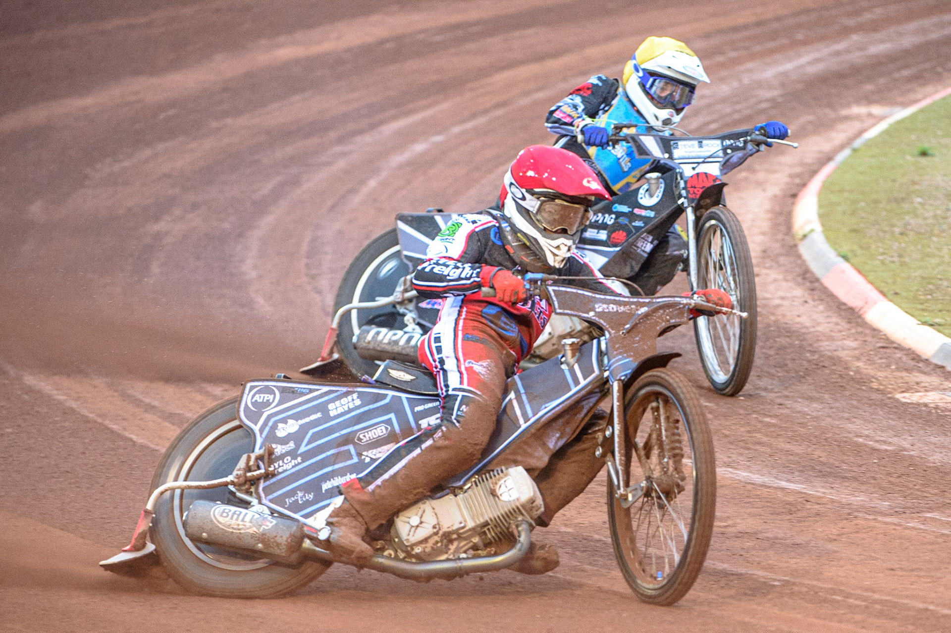 MANCHESTER, UK. AUGUST 20TH  Sam McGurk  (Red) leads Archie Freeman  (Yellow)during the National Development League match between Belle Vue Aces and Armadale Devils at the National Speedway Stadium, Manchester on Friday 20th August 2021. (Credit: Ian Charles | MI News)
