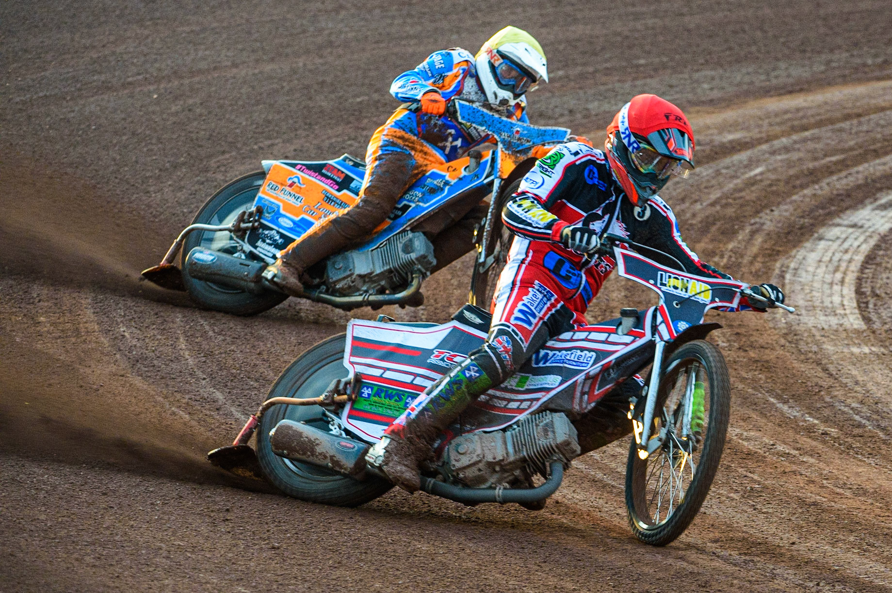 MANCHESTER, UK. JULY 23RD  Jack Parkinson-Blackburn  (Red) leads Danno Verge  (Yellow) during the National Development League match between Belle Vue Colts and Eastbourne Seagulls at the National Speedway Stadium, Manchester on Friday 23rd July 2021. (Credit: Ian Charles | MI News)