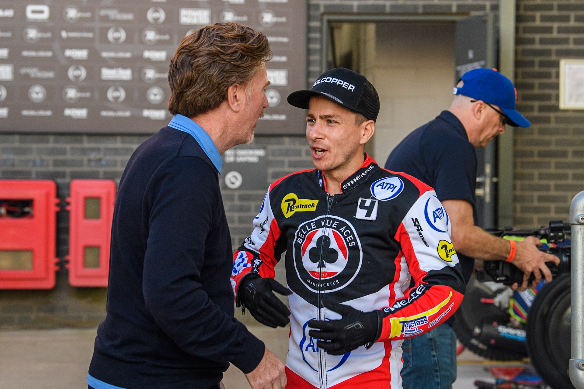 Belle Vue Aces' Ben Cook  (Right) chats with former World Speedway Champion Jason Crump (Left) during the Rowe Motor Oil Premiership Play Off Semi Final 2, 1st Leg match between Belle Vue Aces and Sheffield Tigers at the National Speedway Stadium, Manchester on Monday 16th September 2024. (Photo: Ian Charles | MI News)