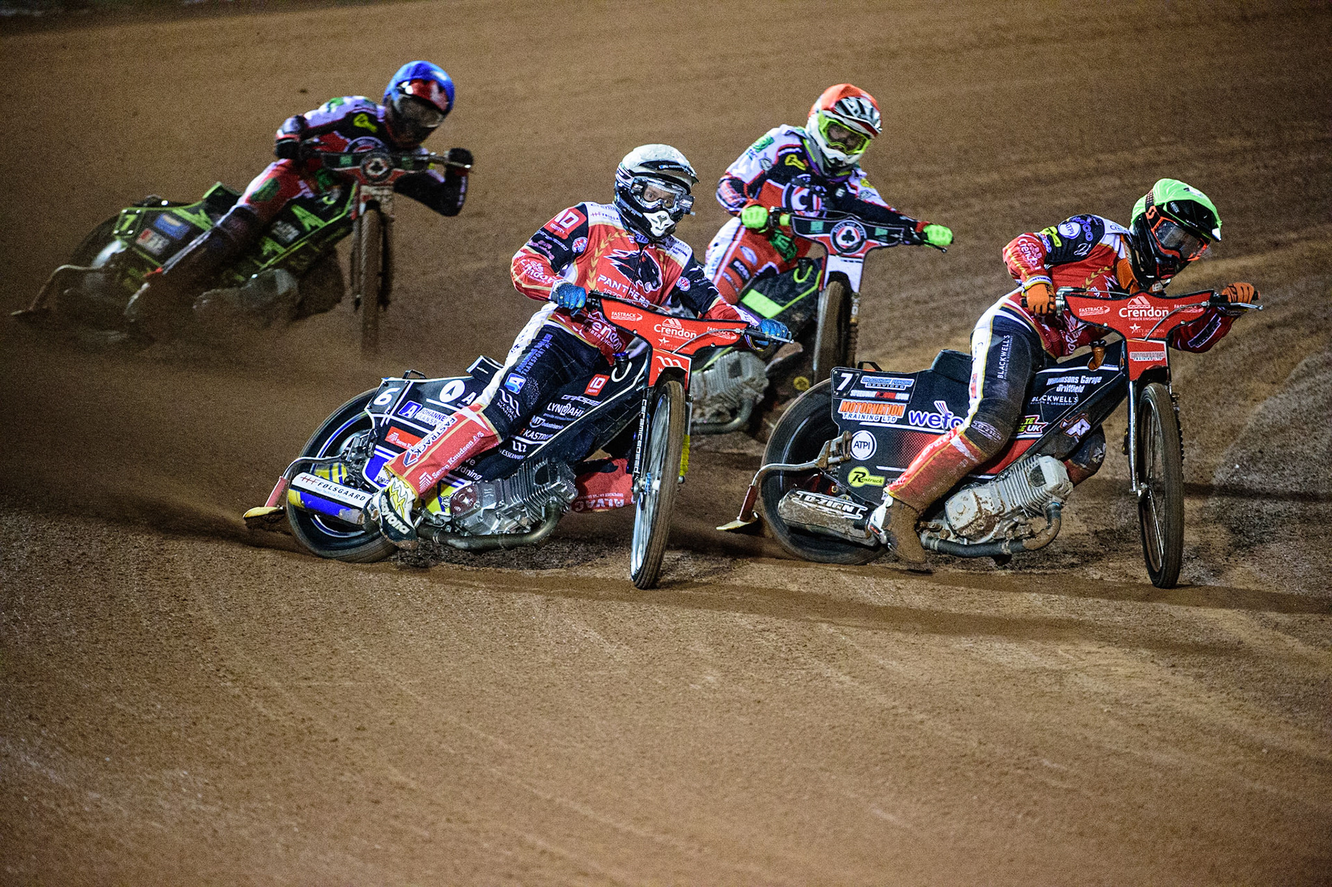 MANCHESTER, UK. OCT 11TH  Bjarne Pedersen  (White) and Jordan Palin  (Yellow) lead Tom Brennan (Red) and Jye Etheridge  (Blue) during the SGB Premiership Grand Final 1st Leg between Belle Vue Aces and Peterborough Panthers at the National Speedway Stadium, Manchester on Monday 11th October 2021. (Credit: Ian Charles | MI News)