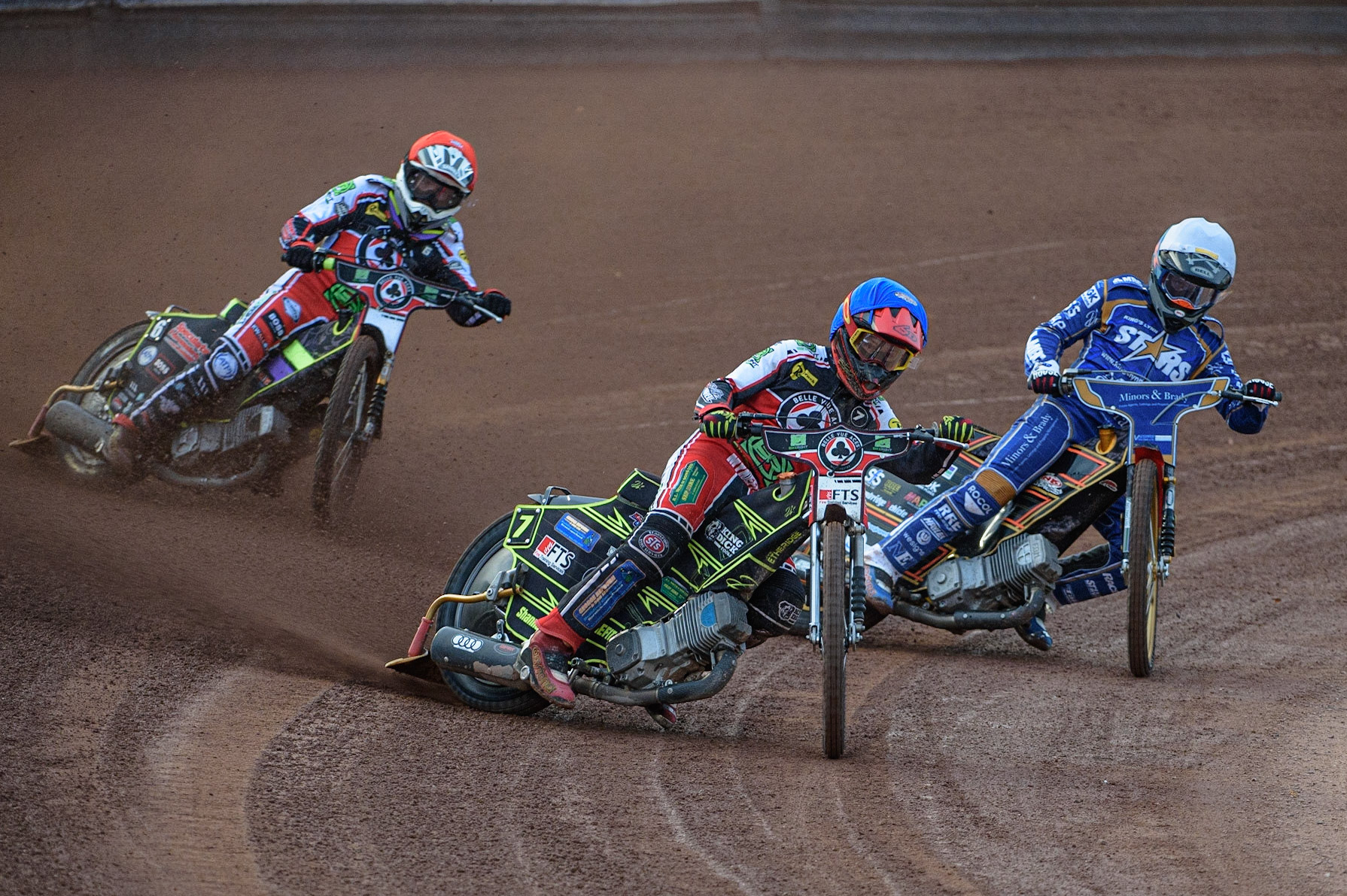 MANCHESTER, UK. AUGUST 23RD    Jye Etheridge  (Blue) leads Tom Brennan  (Red) and Connor Mountain  (White) during the SGB Premiership match between Belle Vue Aces and King's Lynn Stars at the National Speedway Stadium, Manchester on Monday 23rd August 2021. (Credit: Ian Charles | MI News)