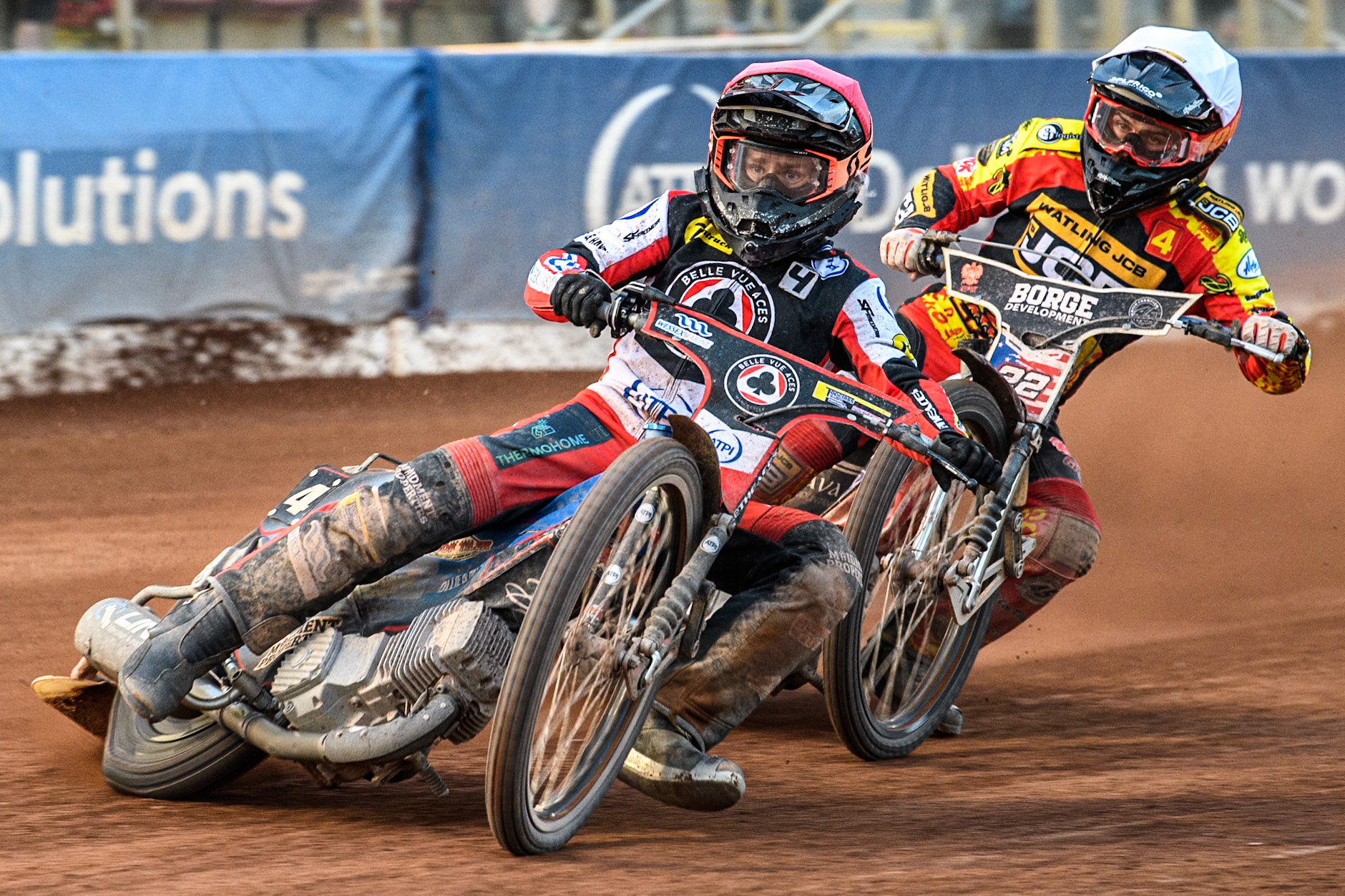 Belle Vue Aces' Ben Cook in Red leading Leicester Lions' Luke Becker in White during the Rowe Motor Oil Premiership match between Belle Vue Aces and Leicester Lions at the National Speedway Stadium, Manchester on Monday 24th June 2024. (Photo: Ian Charles | MI News)