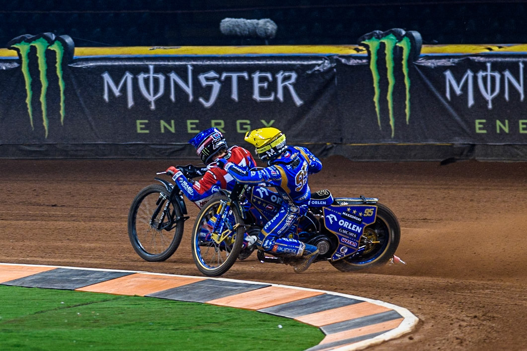 Dan Bewley (99) (Blue) leads  Bartosz Zmarzlik (95) (Yellow) during the FIM Speedway Grand Prix of Great Britain at the Principality Stadium, Cardiff on Saturday 2nd September 2023. (Photo: Ian Charles | MI News)