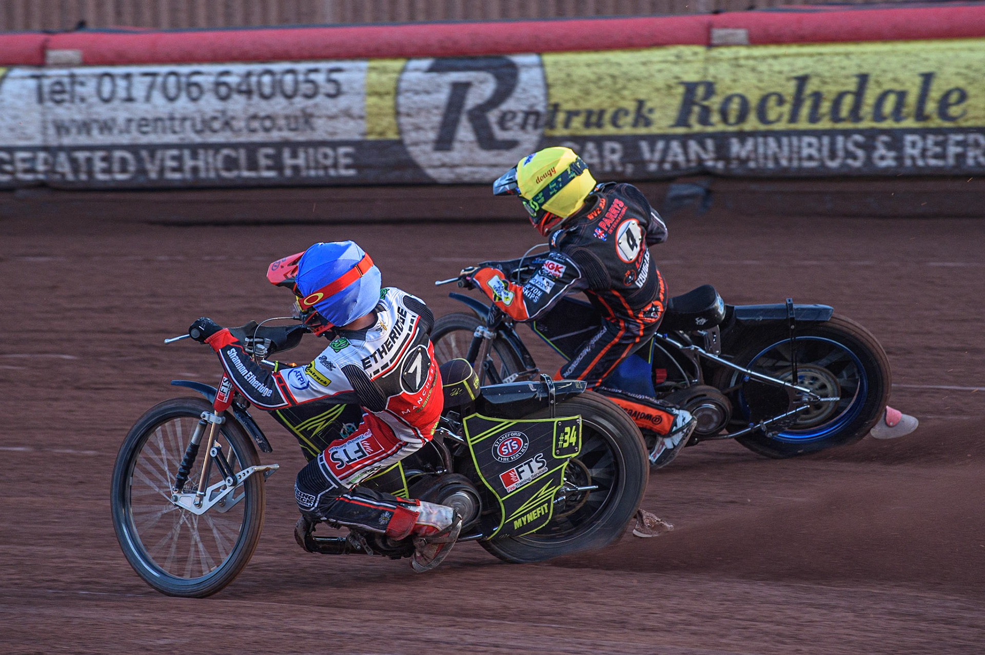 MANCHESTER, UK. JULY 15TH   Jye Etheridge  (Blue) passes Ryan Douglas  (Yellow) during the SGB Premiership match between Belle Vue Aces and Wolverhampton Wolves at the National Speedway Stadium, Manchester on Thursday 15th July 2021. (Credit: Ian Charles | MI News)
