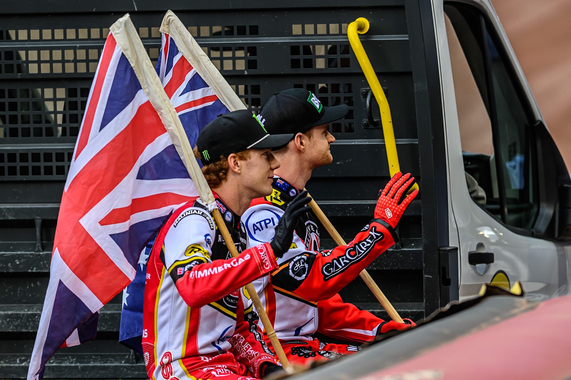 Belle Vue Aces' Dan Bewley (Left) and team mate Brady Kurtz do a lap of honour after their Speedway GP wins during the Rowe Motor Oil Premiership match between Belle Vue Aces and King's Lynn Stars at the National Speedway Stadium, Manchester on Monday 23rd June 2025. (Photo: Ian Charles | MI News)