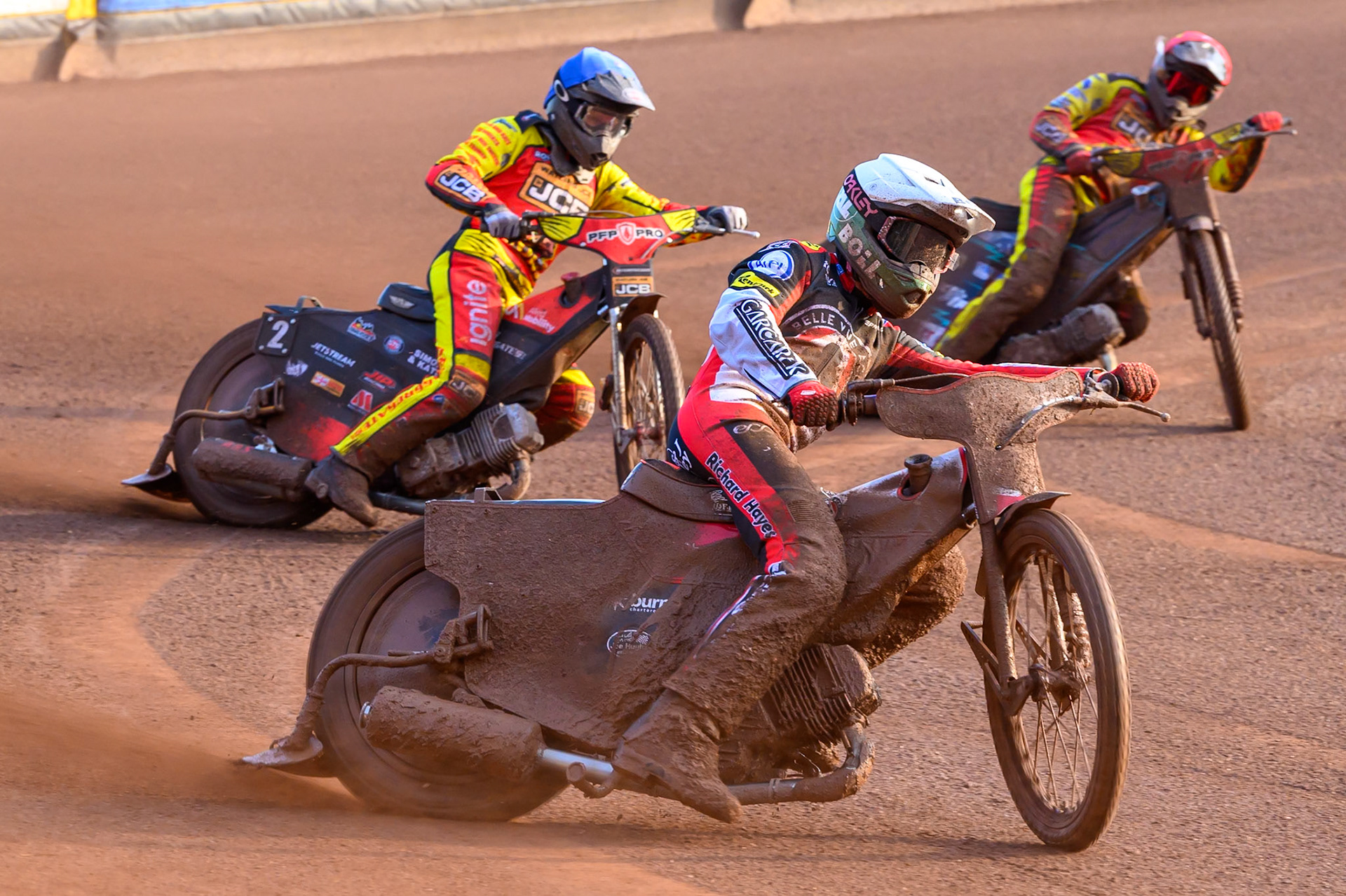 Brady Kurtz of Belle Vue Aces in White leading Dan Thompson of Leicester Lions  in Blue and Ryan Douglas of Leicester Lions in Red  during the Rowe Motor Oil Premiership match between Leicester Lions and Belle Vue Aces at the Hydroscan Arena, Leicester on Thursday 23rd July 2026. (Photo: Ian Charles | MI News)