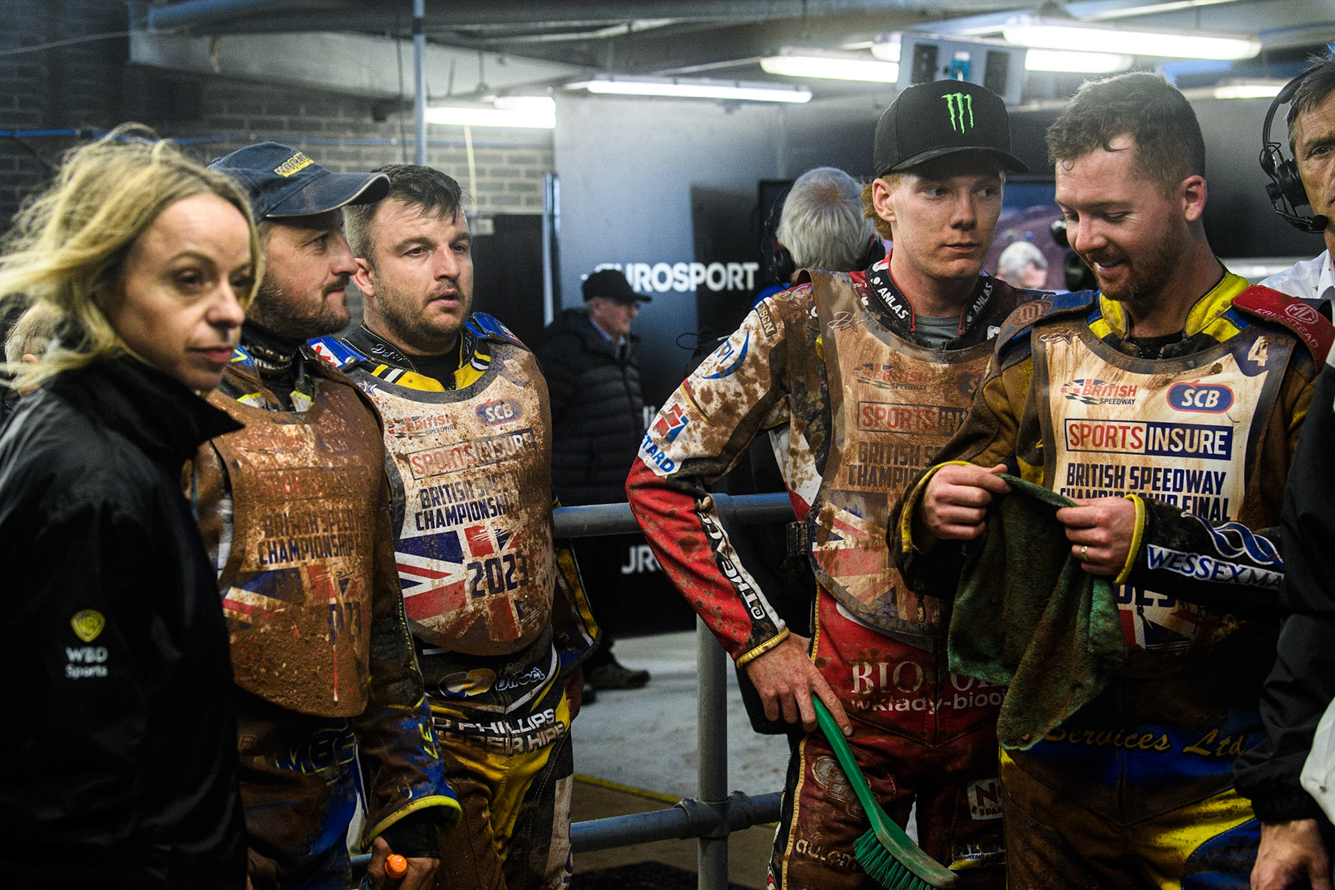 (l - r) Abi Stephens (Eurosport presenter), Chris Harris, Tom Brennan, Dan Bewley and Kyle Howarth watch the TV Monitor during the Sports Insure British Speedway Final at the National Speedway Stadium, Manchester on Monday 14th August 2023. (Photo: Ian Charles | MI News)