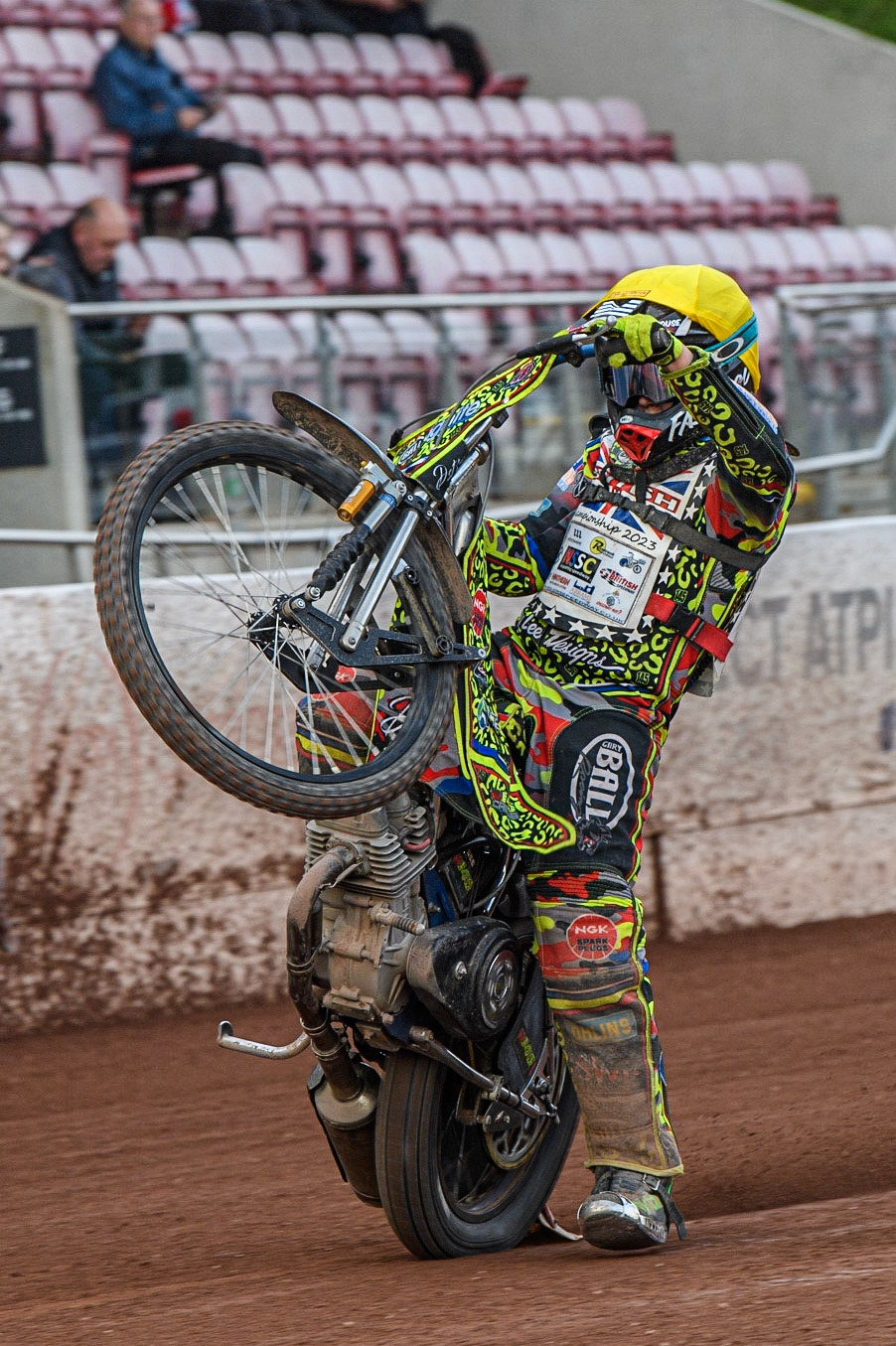 William Cairns celebrates with a wheelie during the British Youth Speedway Championships at the National Speedway Stadium, Manchester on Friday 21st July 2023. (Photo: Ian Charles | MI News)