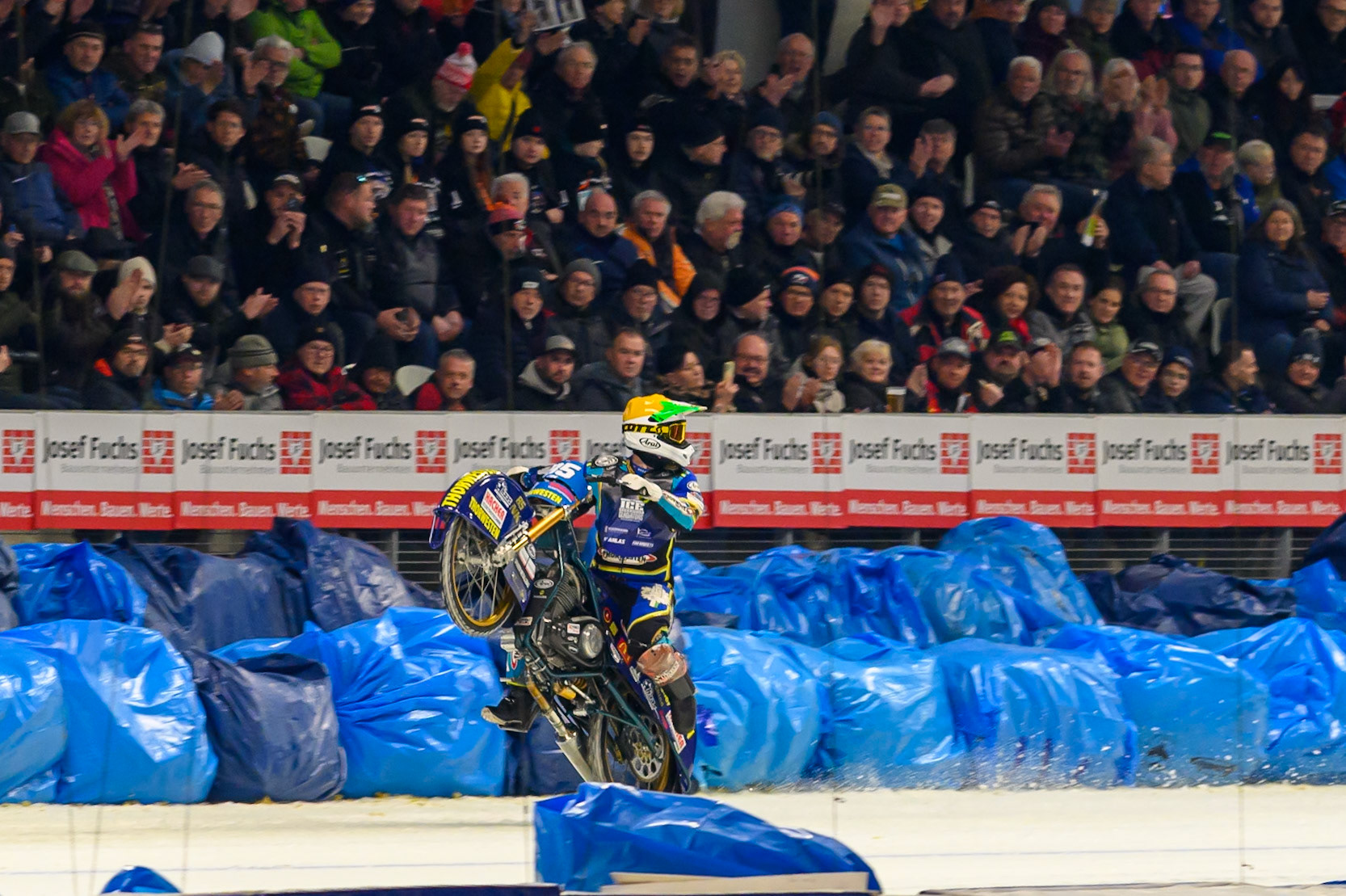Luca Bauer (85) of Italy/Germany celebrates with a wheelie during the Ice Speedway Gladiators World Championship Final 2 at Max-Aicher-Arena, Inzell on Sunday 15th March 2026. (Photo: Ian Charles | MI News)