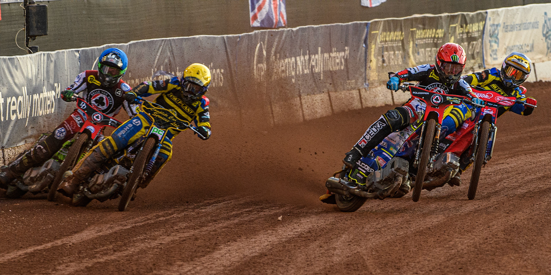 (l - r) Charles Wright (Blue), Kyle Howarth (Yellow), Jaimon Lidsey (Red) and Tobiasz Musielak (White) during the Sports Insure Premiership match between Belle Vue Aces and Sheffield Tigers at the National Speedway Stadium, Manchester on Monday 7th August 2023. (Photo: Ian Charles | MI News)