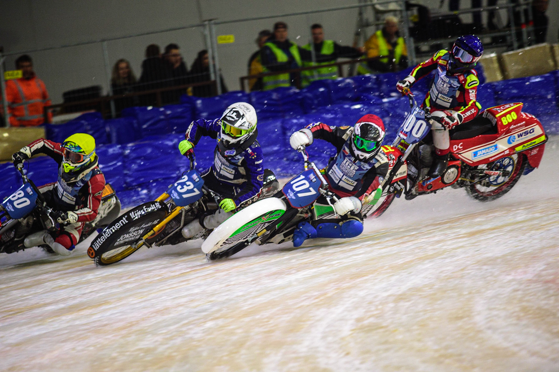 HEERENVEEN, NL. Jasper Iwema (800) (Blue) gets into some difficulty behind Andrej Divis (107) (Red) Jimmy Hörrnell (237)  (White) and Jiri Wildt (80) (Yellow)  during the FIM Ice Speedway Gladiators World Championship Final 4 at Ice Rink Thialf, Heerenveen on Sunday  3 April 2022. (Credit: Ian Charles | MI News)