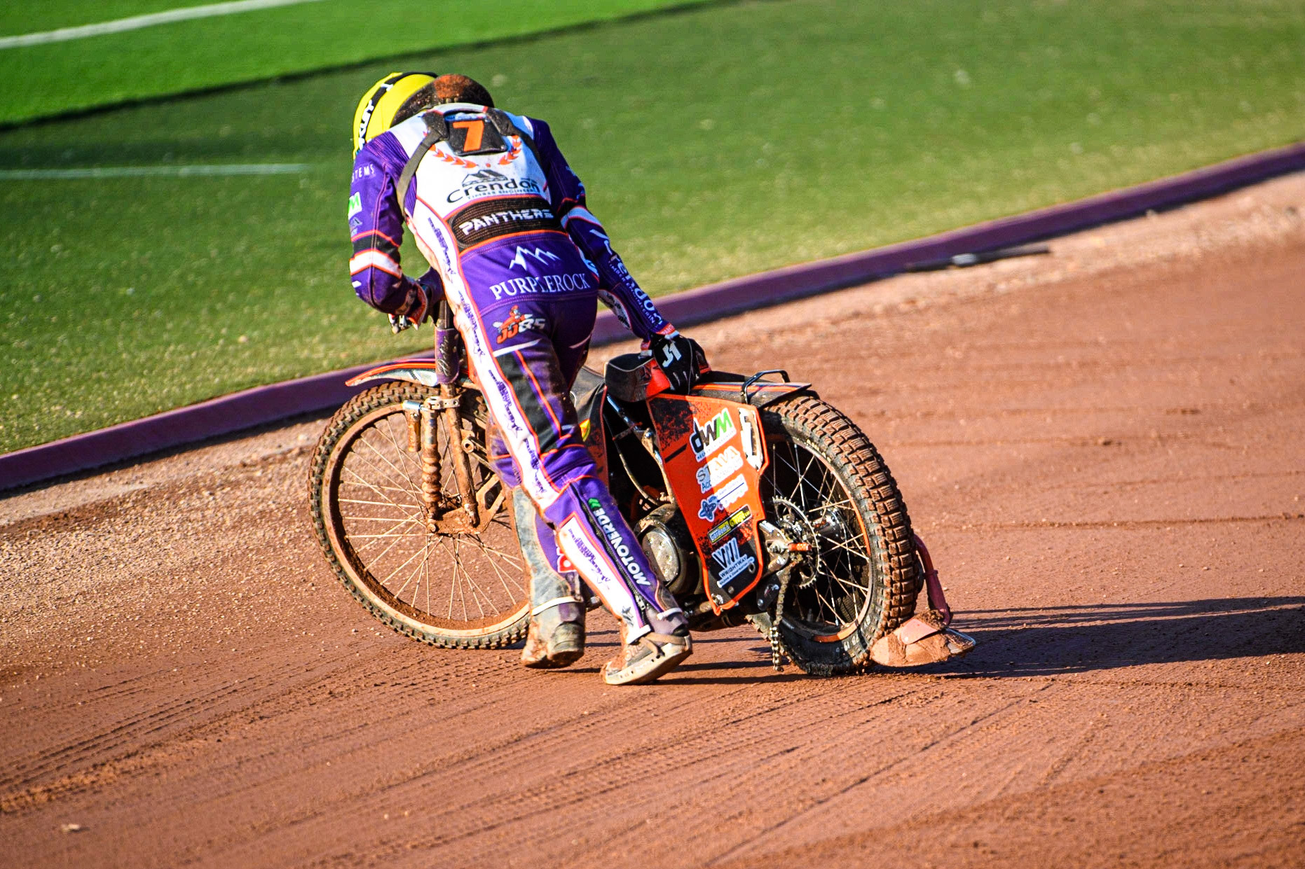 Jordan Jenkins pulls his bike from the track after shedding his chain and jamming the back wheel during the Sports Insure Premiership match between Belle Vue Aces and Peterborough at the National Speedway Stadium, Manchester on Monday 19th June 2023. (Photo: Ian Charles | MI News)