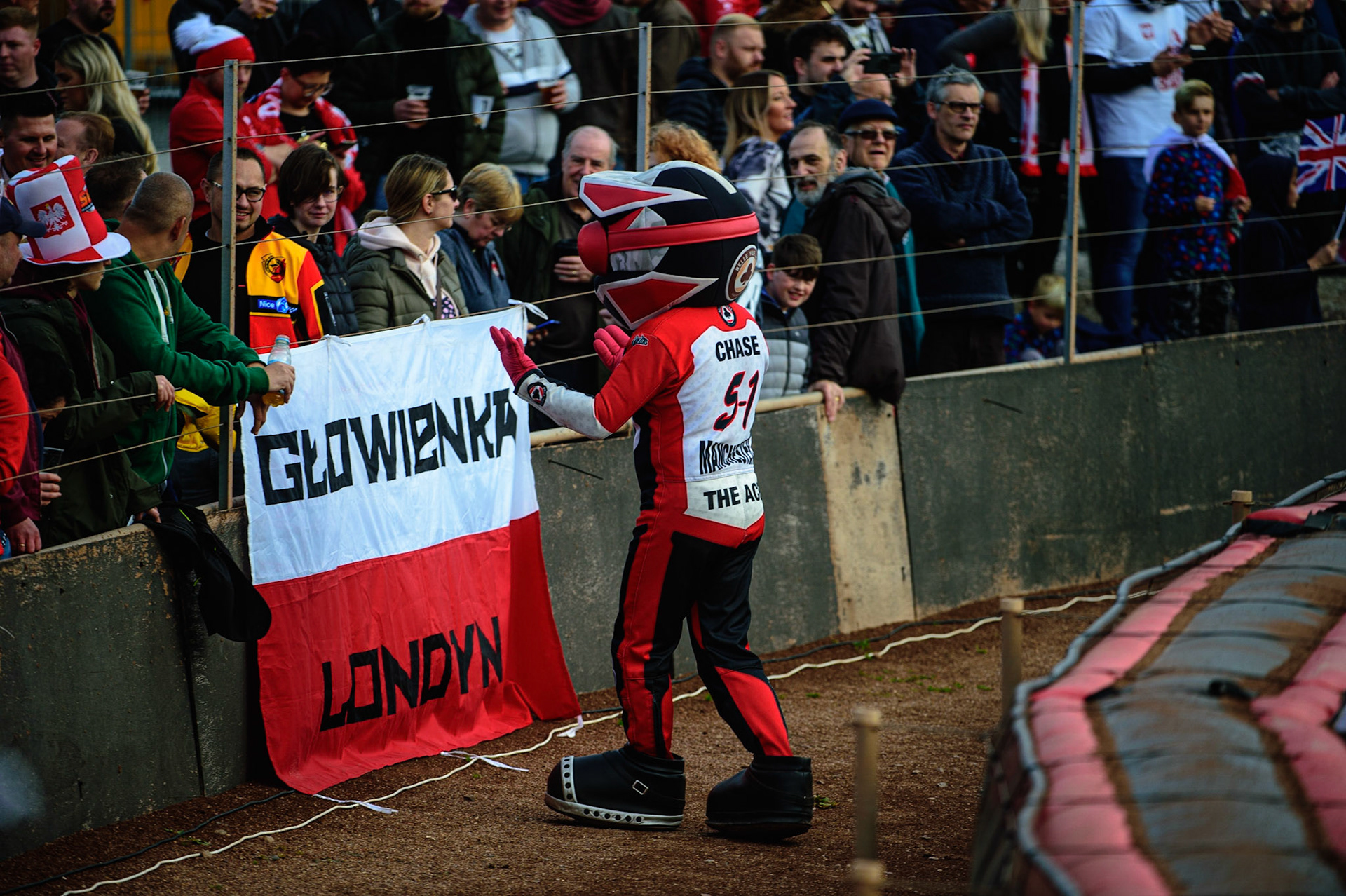 MANCHESTER, UK. OCT 16TH Bel;le Vue Mascot Chase The Ace with the Polish Fans during the Monster Energy FIM Speedway of Nations at the National Speedway Stadium, Manchester on Saturday  16th October 2021. (Credit: Ian Charles | MI News)