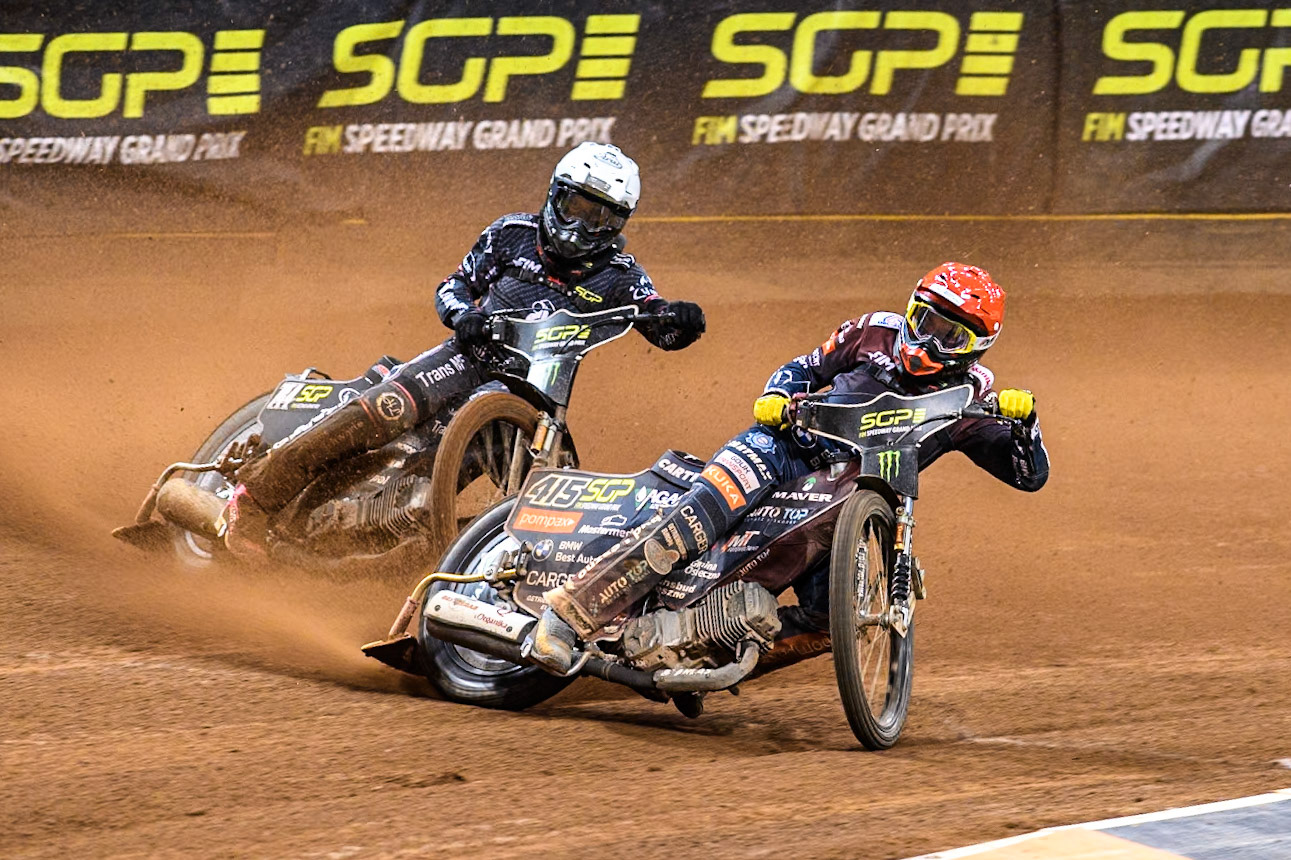 Dominik Kubera (415) of Poland in Red leading Kai Huckenbeck (744) of Germany in White during the FIM Speedway Grand Prix of Great Britain at The Principality Stadium, Cardiff on Saturday 17th August 2024. (Photo: Ian Charles | MI News)