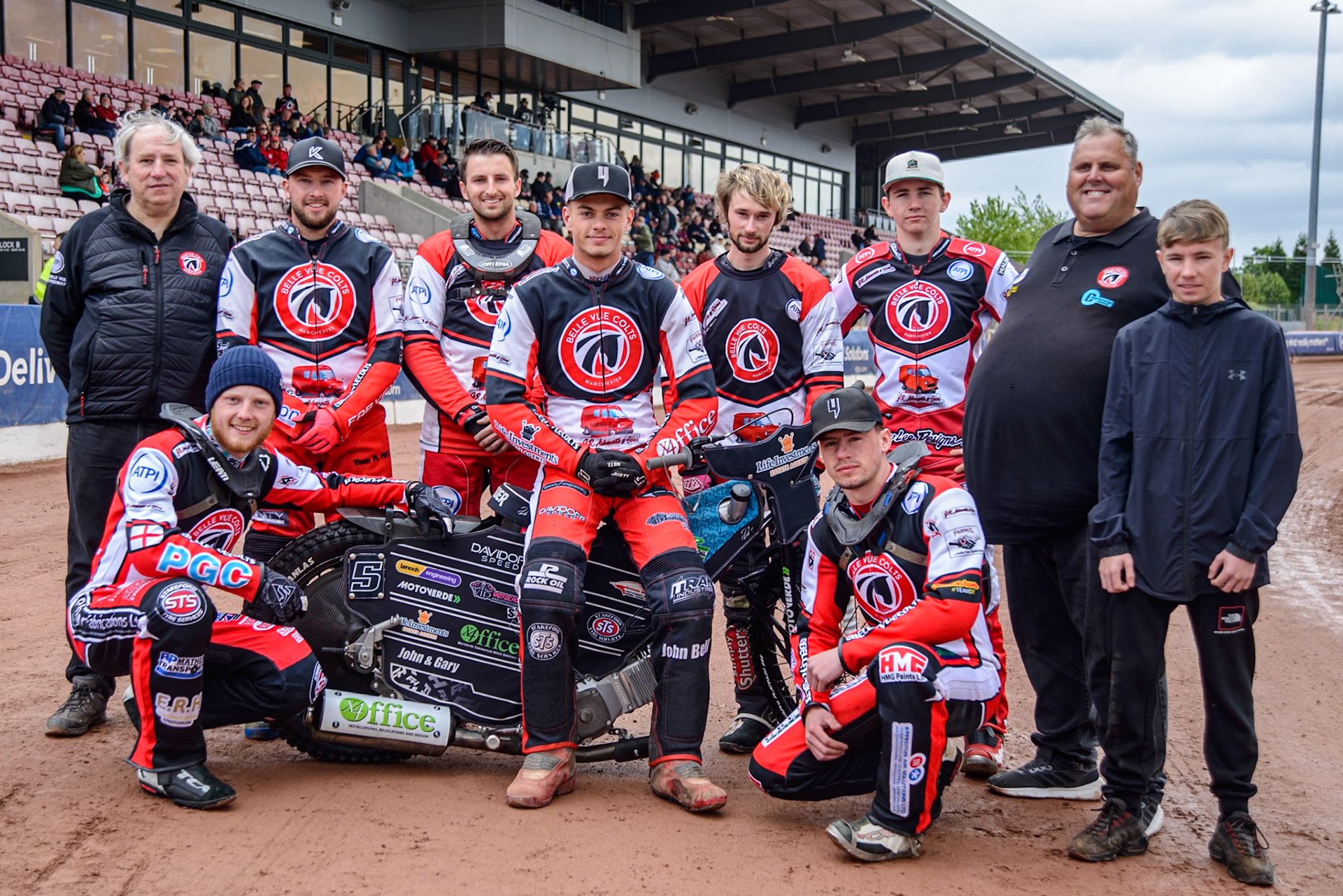 Belle Vue JR Ashworth &amp; Sons Colts: Rear (L to R) Belle Vue Colts' Joint Team Manager Graham Goodwin, Mason Watson, Jack Kingston, Freddy Hodder, Connor King, William Cairns, Joint Team Manager Stephen Williams, Harry Fletcher (injured rider). Kneeling: Jack Shimelt (Left) and Billy Budd during the WSRA National Development League match between Belle Vue Colts and Oxford Chargers at the National Speedway Stadium, Manchester on Sunday 1st June 2025. (Photo: Ian Charles | MI News)