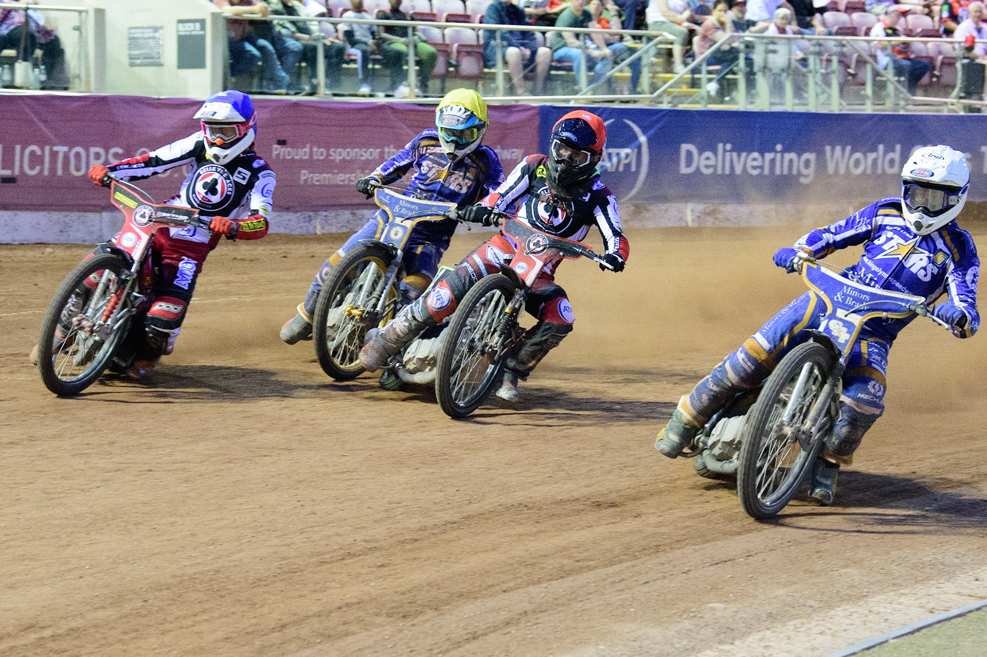 MANCHESTER UK Josh Pickering  (White) leads Tom Brennan  (Red), Max Fricke ‘ (Blue) and Richard Lawson  (Yellow)  during the SGB Premiership match between Belle Vue Aces and King's Lynn Stars at the National Speedway Stadium, Manchester on Monday 11th July 2022. (Credit: Ian Charles | MI News)