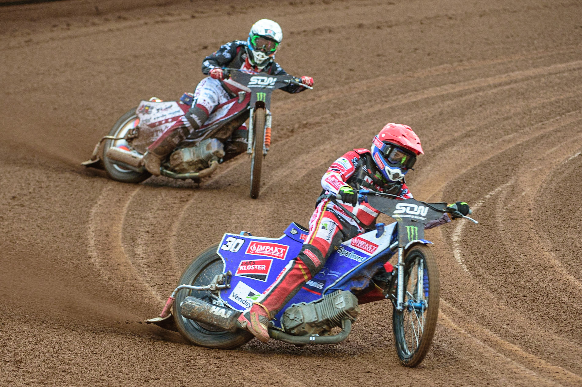 MANCHESTER, UK. OCT 17TH Leon Madsen of Denmark (Red) leads Andzejs Lebedevs of Latvia (White) during the Monster Energy FIM Speedway of Nations at the National Speedway Stadium, Manchester on Sunday  17th October 2021. (Credit: Ian Charles | MI News)