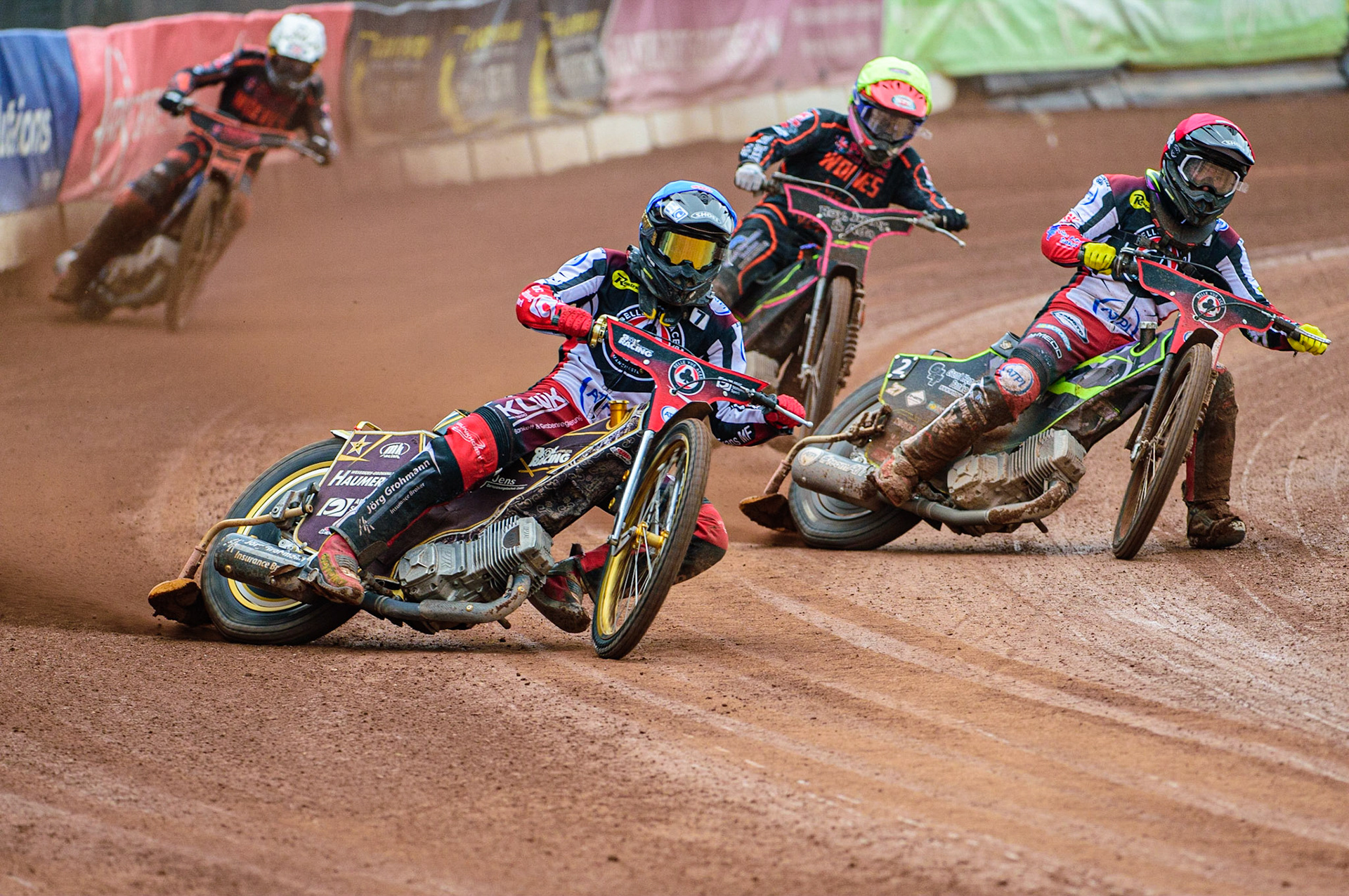 Norick Blödorn  (Blue) leads team mate Tom Brennan (Red)  Leon Flint  (Yellow) and Steve Worrall  (White) during the SGB Premiership match between Belle Vue Aces and Wolverhampton Wolves at the National Speedway Stadium, Manchester on Monday 29th August 2022. (Credit: Ian Charles | MI News)