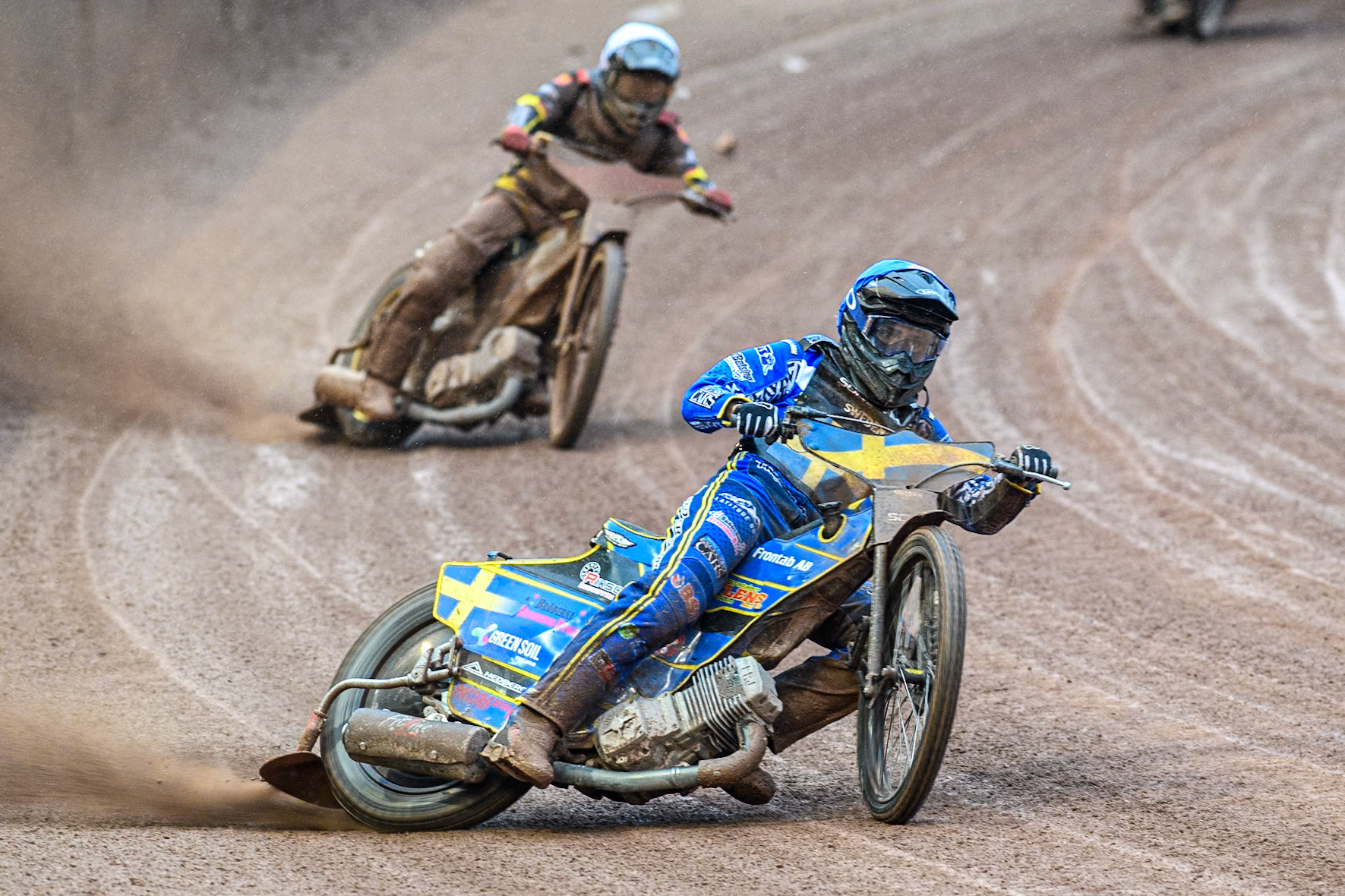 Philip Hellström-Bängs of Sweden in Blue leading Norick Blödorn of Germany in White during the Monster Energy FIM Speedway of Nations 2 (Under 21) Final at the National Speedway Stadium, Manchester on Friday 12th July 2024. (Photo: Ian Charles | MI News)