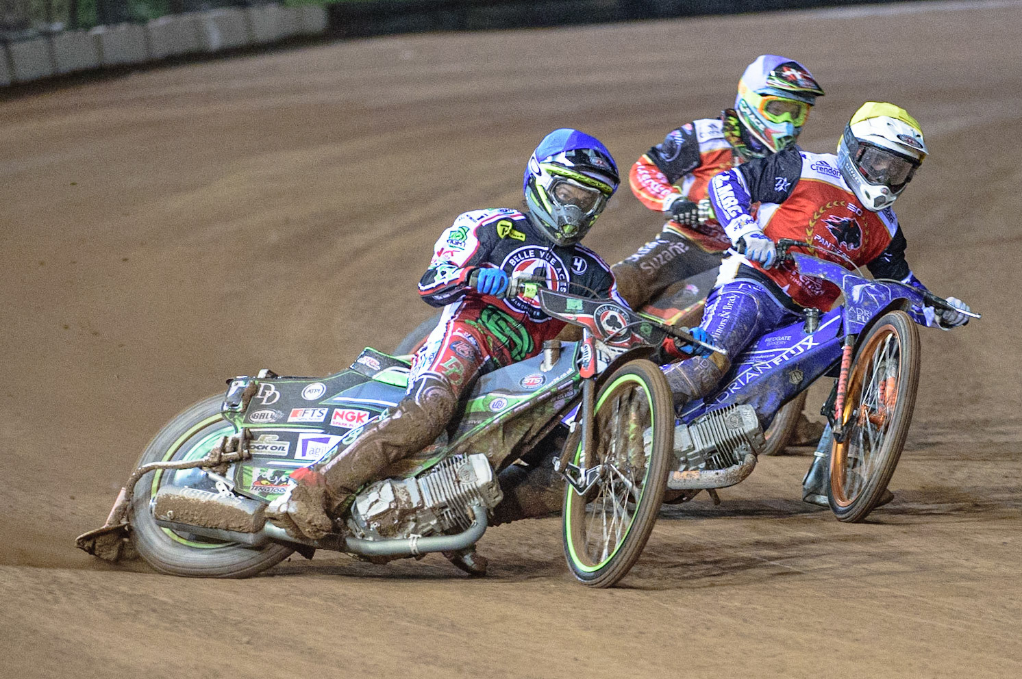MANCHESTER, UK. OCT 11TH  Charles Wright  (Blue) leads Lewis Kerr  (Yellow) and Michael Palm Toft  (White) during the SGB Premiership Grand Final 1st Leg between Belle Vue Aces and Peterborough Panthers at the National Speedway Stadium, Manchester on Monday 11th October 2021. (Credit: Ian Charles | MI News)