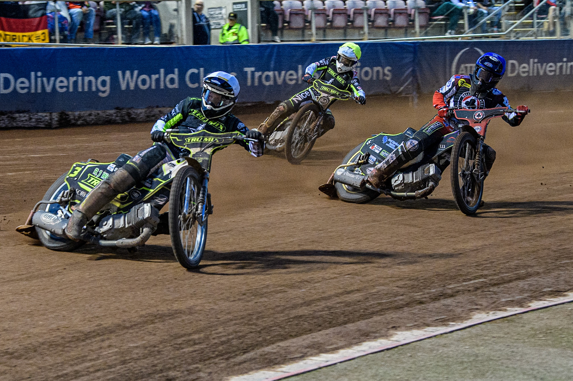 Danny King (White) leads Tom Brennan (Blue) and Emil Sayfutdinov (Yellow) during the Sports Insure Premiership match between Belle Vue Aces and Ipswich Witches at the National Speedway Stadium, Manchester on Monday 17th July 2023. (Photo: Ian Charles | MI News)