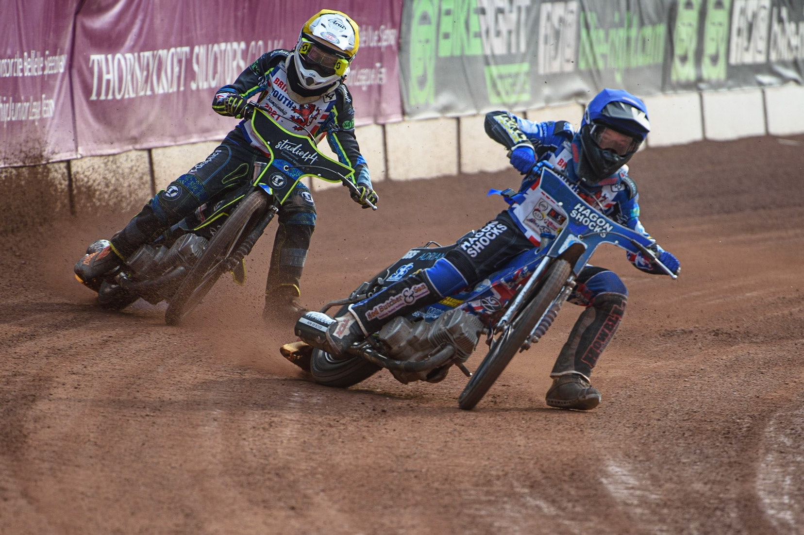 MANCHESTER, UK. MAY 28TH   Jody Scott  (Blue) leads Freddy Hodder  (Yellow) during the British Junior Championship at the National Speedway Stadium, Manchester on Friday 28th May 2021. (Credit: Ian Charles | MI News)