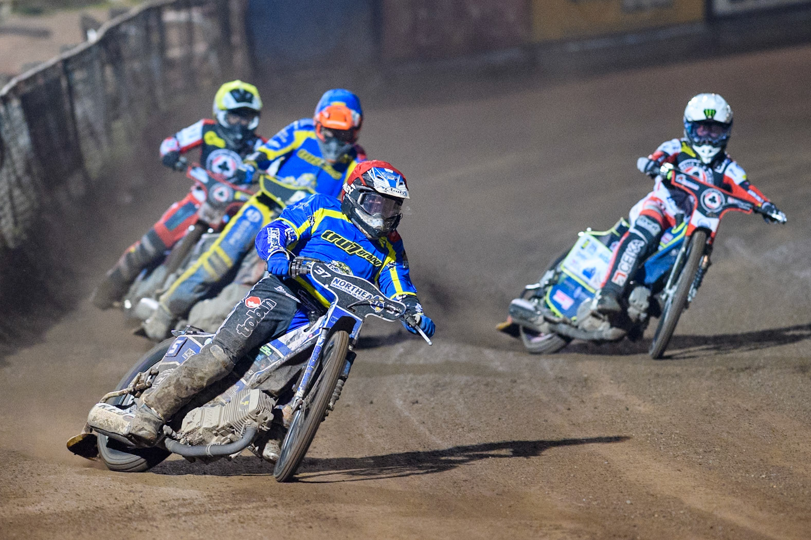 Sheffield Tigers' Guest Rider Chris Harris  leading Sheffield Tigers' Jason Edwards  in Blue, Belle Vue Aces' Jaimon Lidsey  in White and Belle Vue Aces' Ben Cook  in Yellow during the Rowe Motor Oil Premiership Play Off Semi Final 2nd leg between Sheffield Tigers and Belle Vue Aces at Owlerton Stadium, Sheffield on Thursday 19th September 2024. (Photo: Ian Charles | MI News)