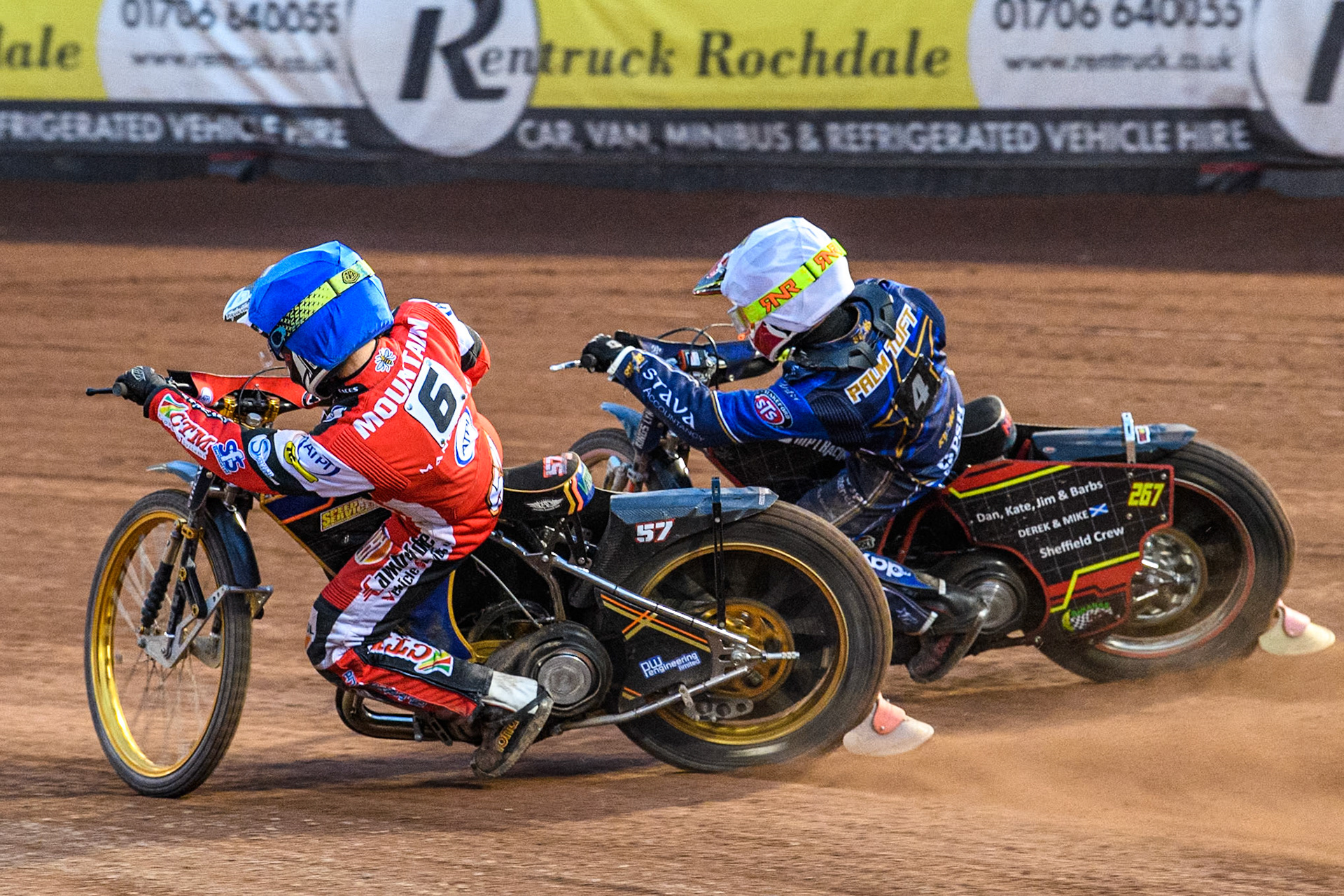 Belle Vue Aces' Connor Mountain in Blue rides inside King Lynn Stars' Michael Palm Toft in White during the Rowe Motor Oil Premiership match between Belle Vue Aces and King's Lynn Stars at the National Speedway Stadium, Manchester on Monday 20th May 2024. (Photo: Ian Charles | MI News)