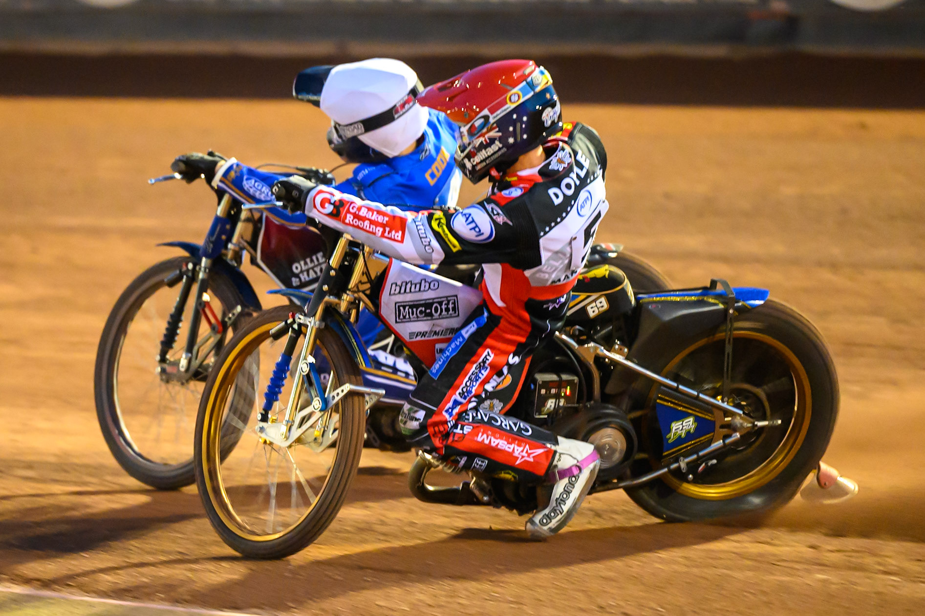 Jason Doyle of Belle Vue Aces in Red on the inside of Ben Cook of Kings Lynn Stars in White during the Rowe Motor Oil Premiership match between Belle Vue Aces and King's Lynn Stars at the National Speedway Stadium, Manchester on Monday 10th August 2026. (Photo: Ian Charles | MI News)