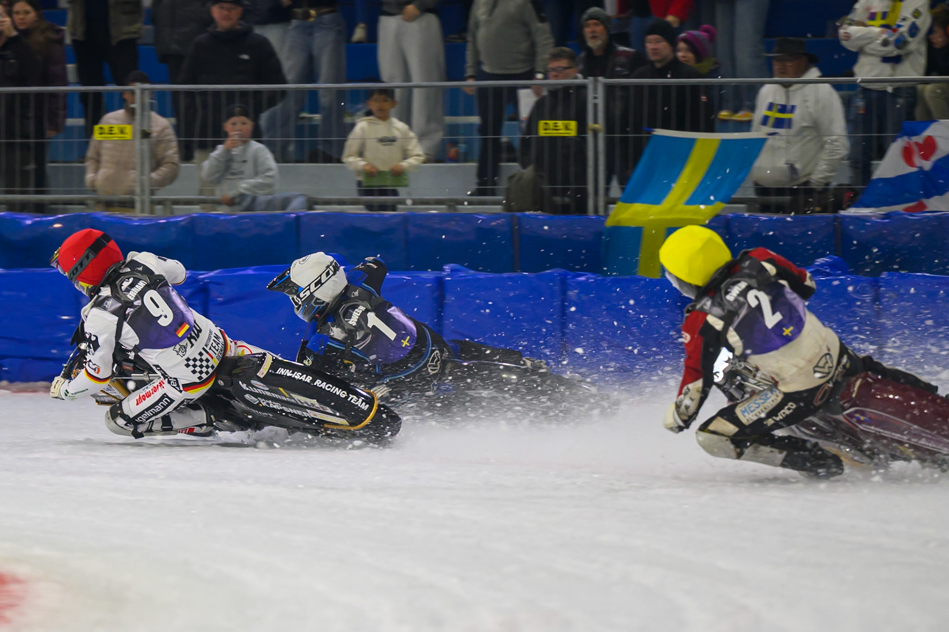 Max Niedermaier (9) of Germany  in Red rides inside Niclas Svensson (1) of Sweden  in White during the FIM Ice Speedway Of Nations at Ice Rink Thialf, Heerenveen on Sunday 12th April 2026. (Photo: Ian Charles | MI News)