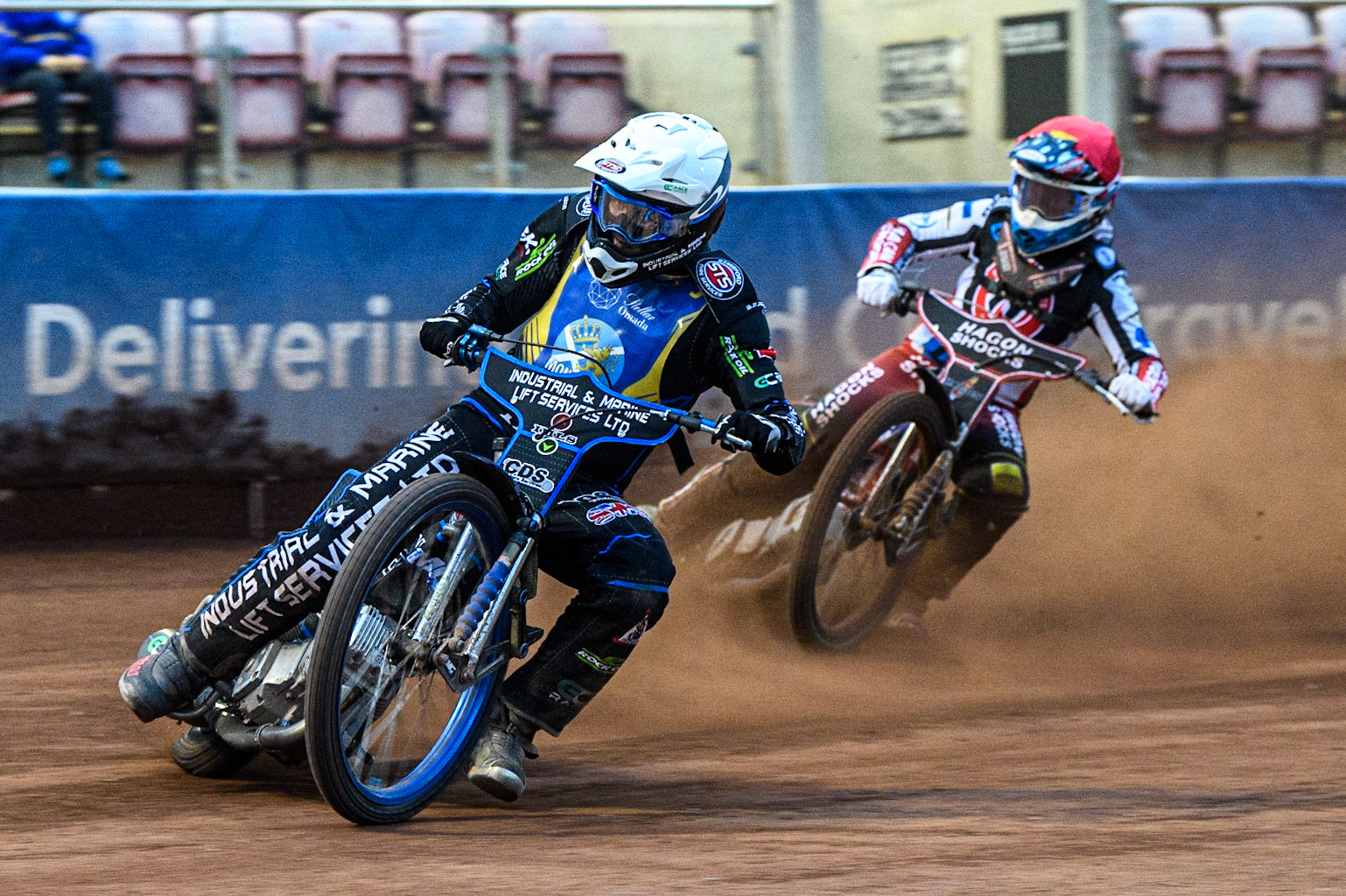 Max Clegg (White) leads Sam Hagon (Red) during the National Development League match between Belle Vue Colts and Edinburgh Monarchs Academy at the National Speedway Stadium, Manchester on Friday 21st July 2023. (Photo: Ian Charles | MI News)