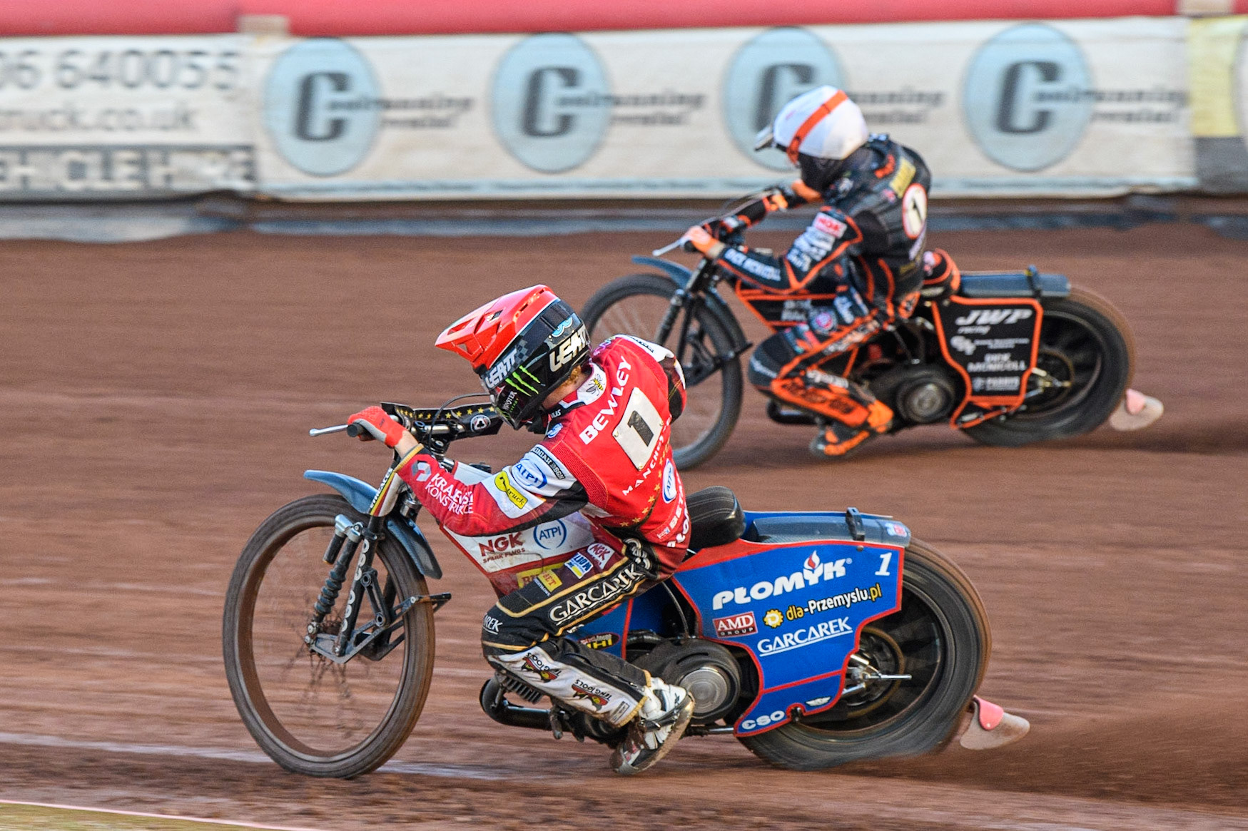 Dan Bewley (Red) chases Sam Masters (White) during the Sports Insure Premiership match between Belle Vue Aces and Wolverhampton Wolves at the National Speedway Stadium, Manchester on Monday 3rd July 2023. (Photo: Ian Charles | MI News)