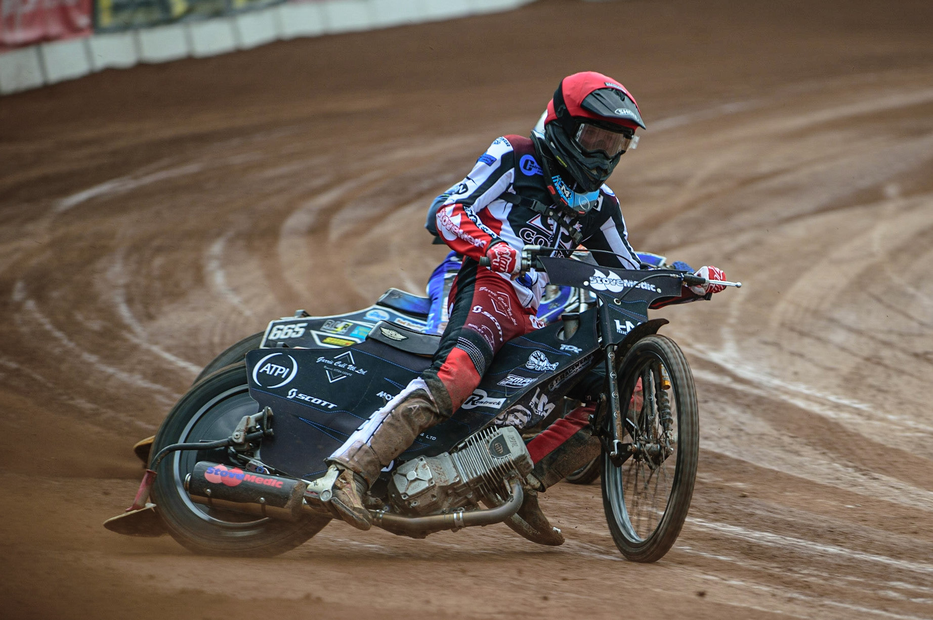 MANCHESTER, UK. APR 15TH  Harry McGurk  (Red) ahead of Jody Scott  (White) (partially hidden)  during the National Development League match between Belle Vue Colts and Plymouth Centurions at the National Speedway Stadium, Manchester on Friday 15th April 2022. (Credit: Ian Charles | MI News)